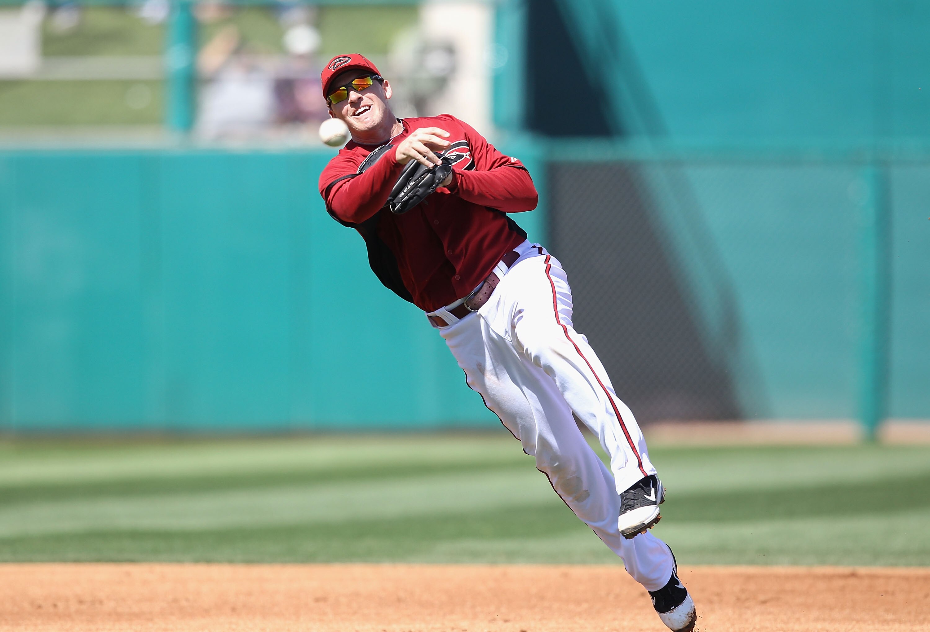 TUCSON, AZ - MARCH 07:  Infielder Stephen Drew #6 of the Arizona Diamondbacks fields a ground ball out against the Chicago White Sox during the spring training game at Kino Veterans Memorial Stadium on March 7, 2011 in Tucson, Arizona. The charity game is