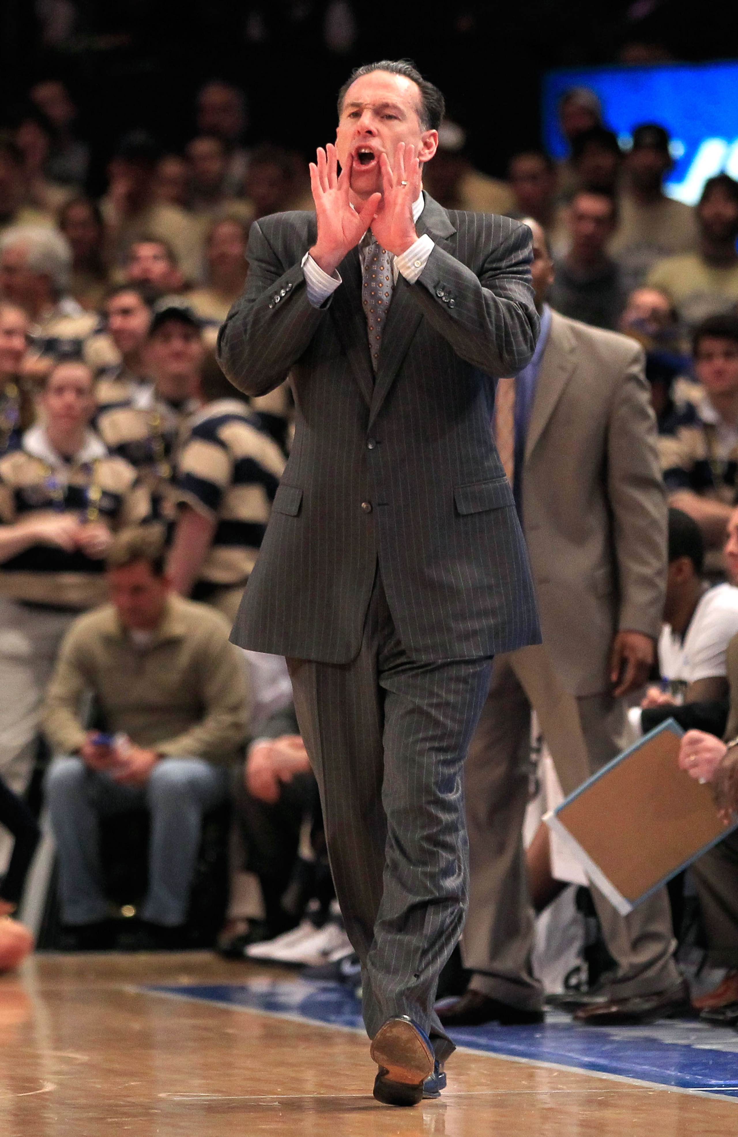 NEW YORK, NY - MARCH 10: Head coach Jamie Dixon of the Pittsburgh Panthers gestures from the bench against the Connecticut Huskies during the quarterfinals of the 2011 Big East Men's Basketball Tournament presented by American Eagle Outfitters at Madiso NEW YORK, NY - MARCH 10: Head coach Jamie Dixon of the Pittsburgh Panthers gestures from the bench against the Connecticut Huskies during the quarterfinals of the 2011 Big East Men's Basketball Tournament presented by American Eagle Outfitters at Madiso