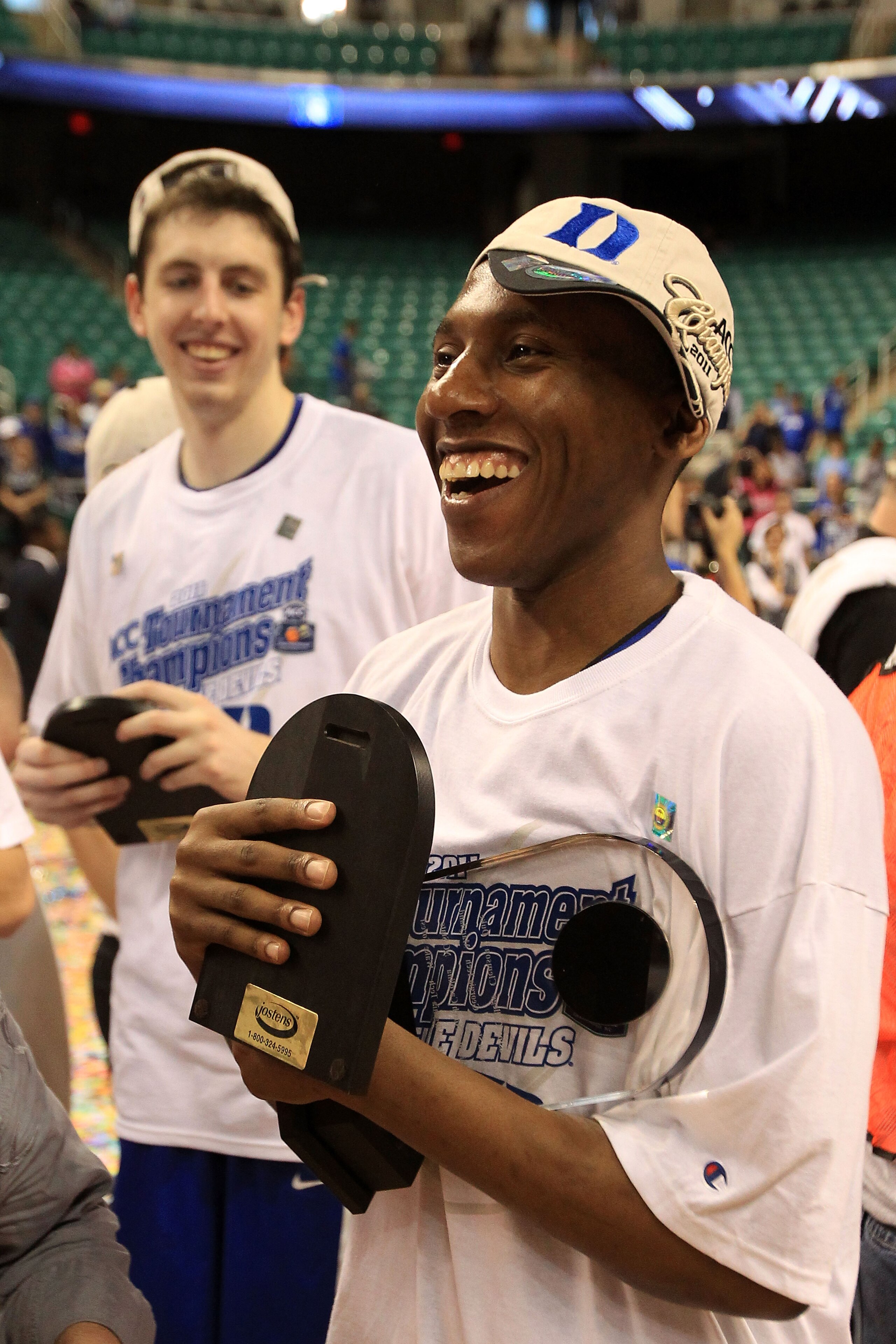 GREENSBORO, NC - MARCH 13: Nolan Smith #2 of the Duke Blue Devils celebrates after being named MVP and defeating the North Carolina Tar Heels 75-58 in the championship game of the 2011 ACC men's basketball tournament at the Greensboro Coliseum on March 1 GREENSBORO, NC - MARCH 13: Nolan Smith #2 of the Duke Blue Devils celebrates after being named MVP and defeating the North Carolina Tar Heels 75-58 in the championship game of the 2011 ACC men's basketball tournament at the Greensboro Coliseum on March 1
