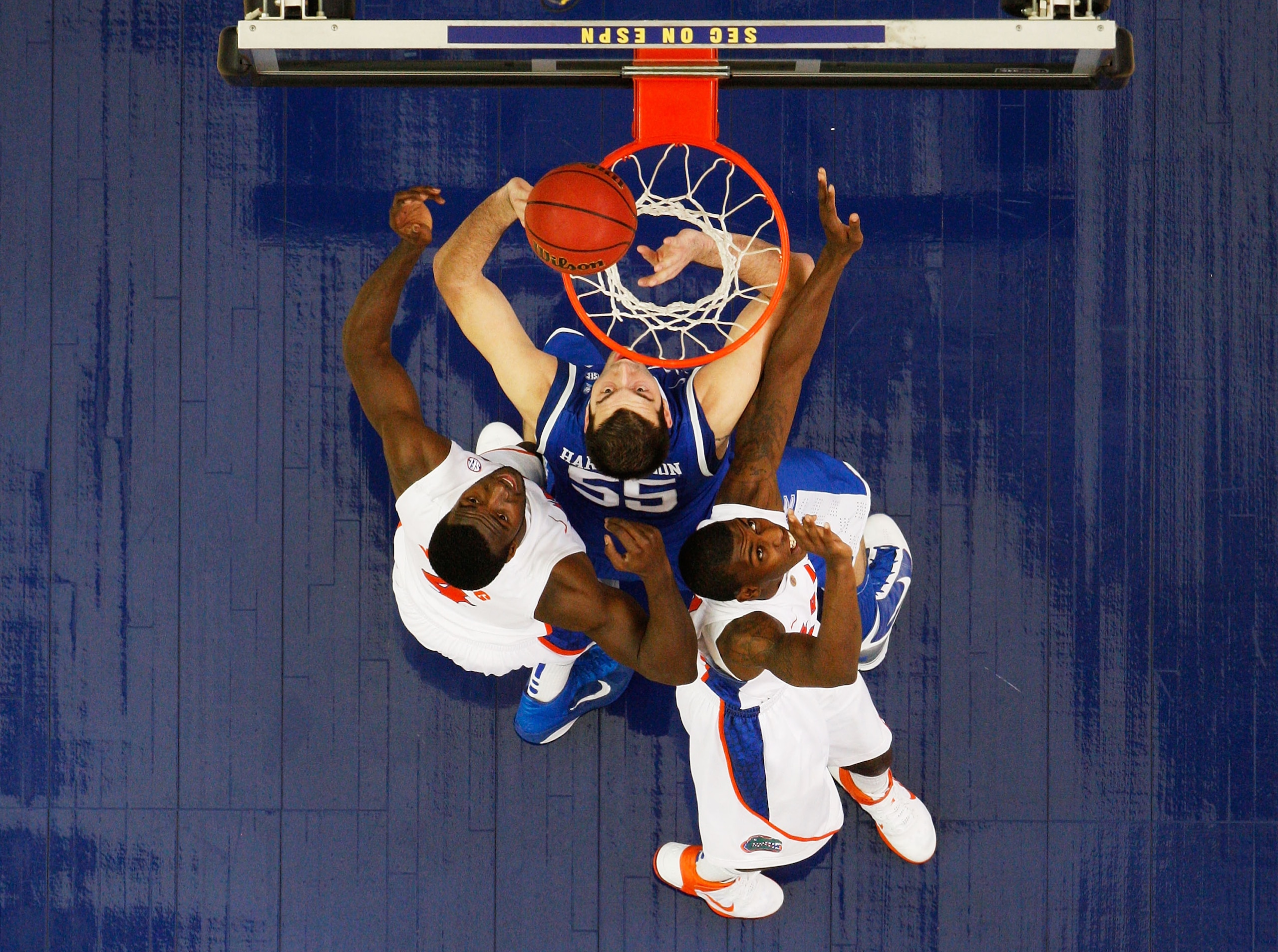 ATLANTA - MARCH 13:  Josh Harrellson #55 of the Kentucky Wildcats shoots against the Florida Gators in the championship game of the SEC Men's Basketball Tournament at Georgia Dome on March 13, 2011 in Atlanta, Georgia.  (Photo by Kevin C. Cox/Getty Images