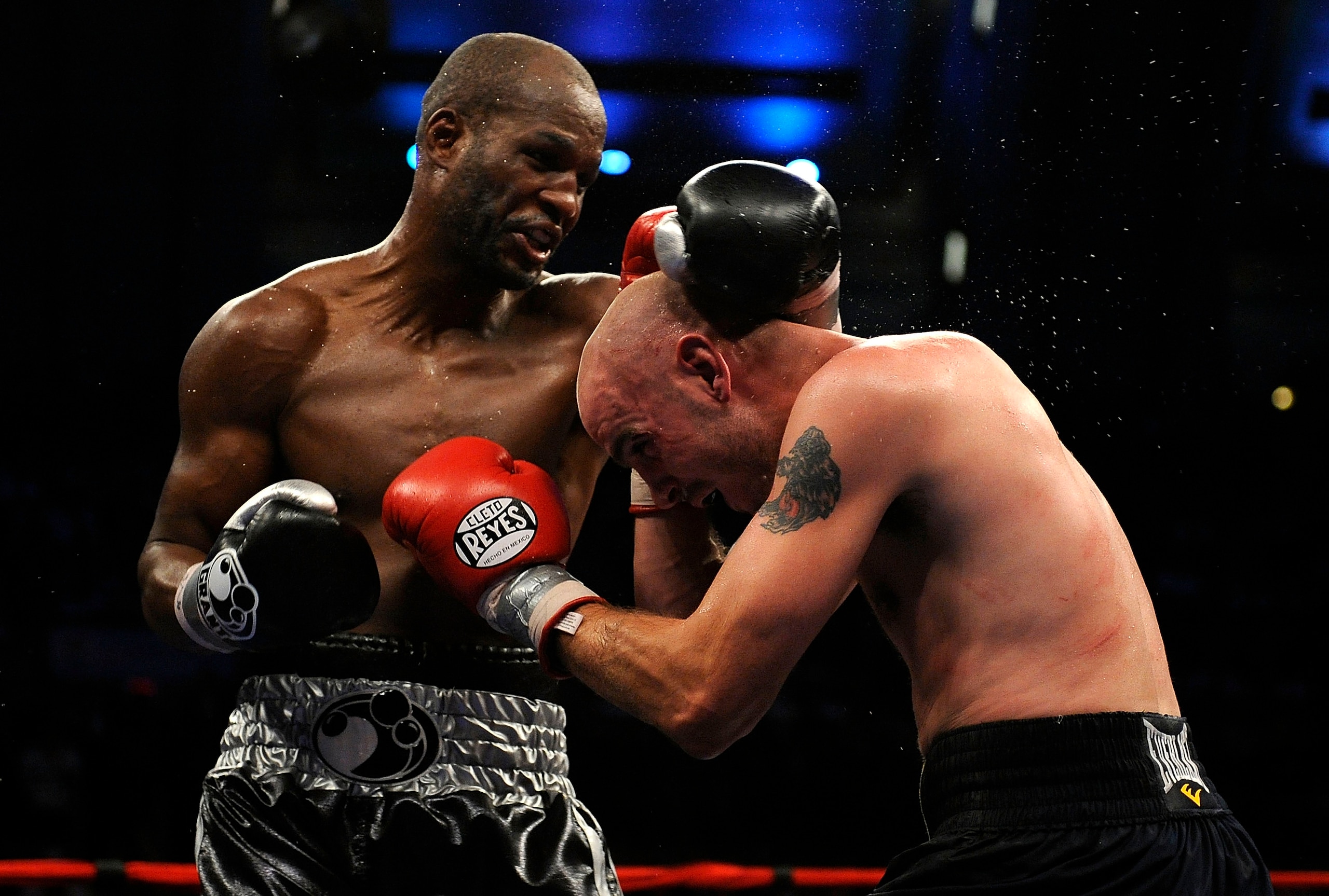 ATLANTIC CITY, NJ - OCTOBER 18:  Bernard Hopkins of Philadelphia,  Pennsylvania (L) connects to Kelly Pavlik of Youngstown, Ohio during their light heavyweight bout at Boardwalk Hall on October 18, 2008 in Atlantic City, New Jersey.  (Photo by Jeff Zeleva