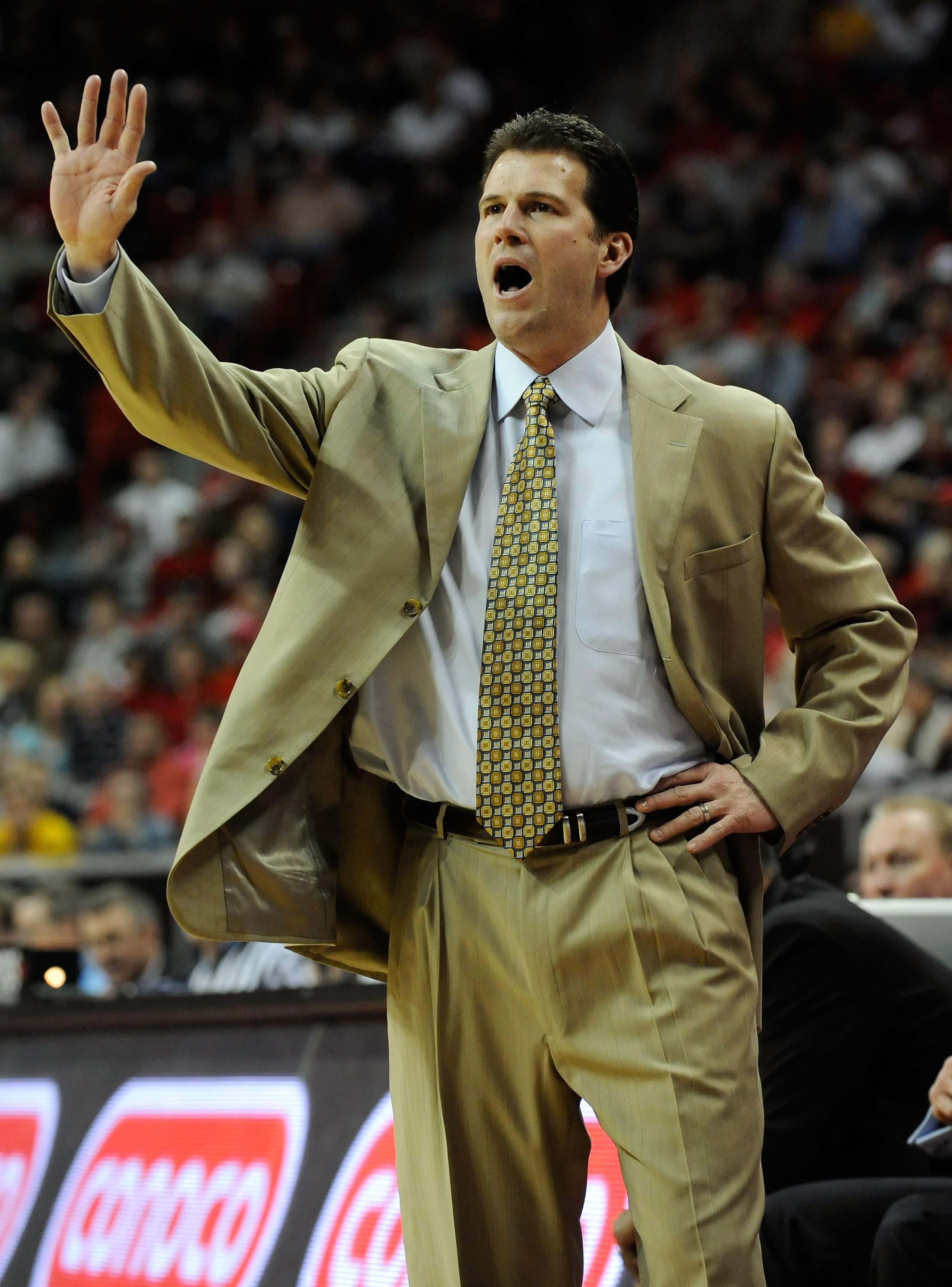 LAS VEGAS - MARCH 11:  Head coach Steve Alford of New Mexico signals to his players during their 75-69 quarterfinal game victory over the Air Force Falcons during the Conoco Mountain West Conference Basketball tournament at the Thomas & Mack Center March