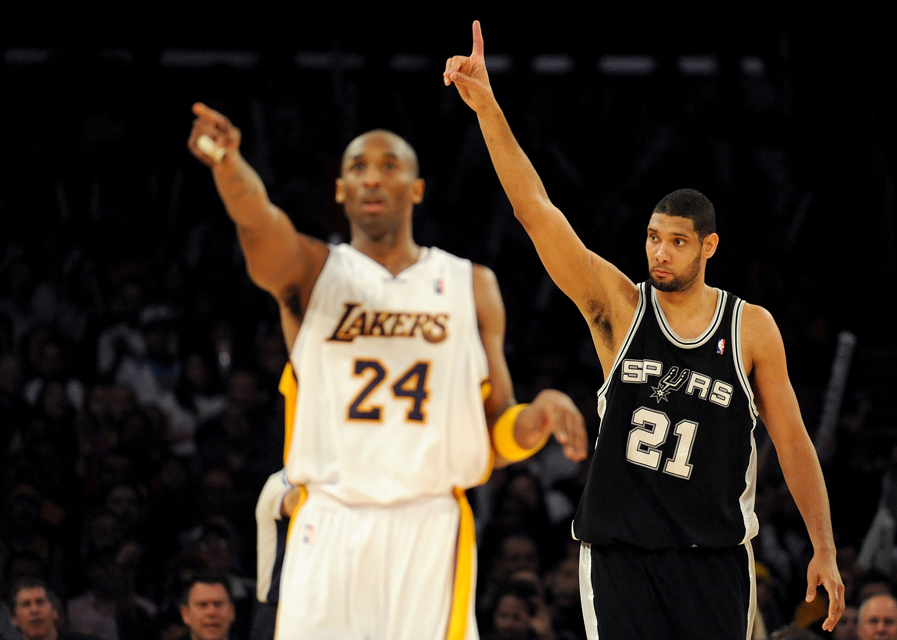 LOS ANGELES, CA - JANUARY 25:  Tim Duncan #21 of the San Antonio Spurs reacts to a foul next to Kobe Bryant #24 of the Los Angeles Lakers during the forth quarter at the Staples Center on January 25, 2009 in Los Angeles, California.  The Lakers defeated t