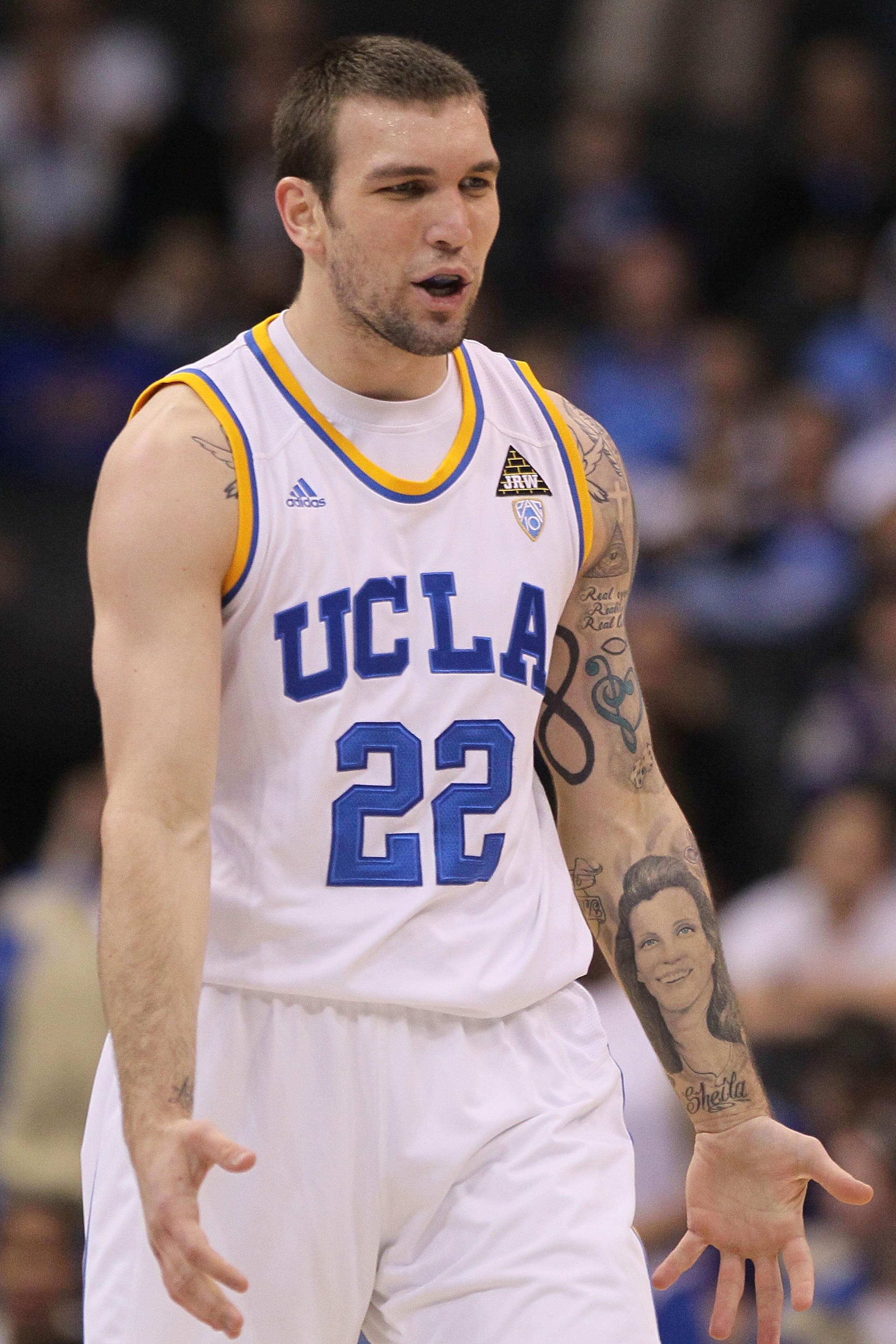 LOS ANGELES, CA - MARCH 10: Reeves Nelson #22 of the UCLA Bruins reacts in the second half while taking on the Oregon Ducks in the quarterfinals of the 2011 Pacific Life Pac-10 Men's Basketball Tournament at Staples Center on March 10, 2011 in Los Angele LOS ANGELES, CA - MARCH 10: Reeves Nelson #22 of the UCLA Bruins reacts in the second half while taking on the Oregon Ducks in the quarterfinals of the 2011 Pacific Life Pac-10 Men's Basketball Tournament at Staples Center on March 10, 2011 in Los Angele