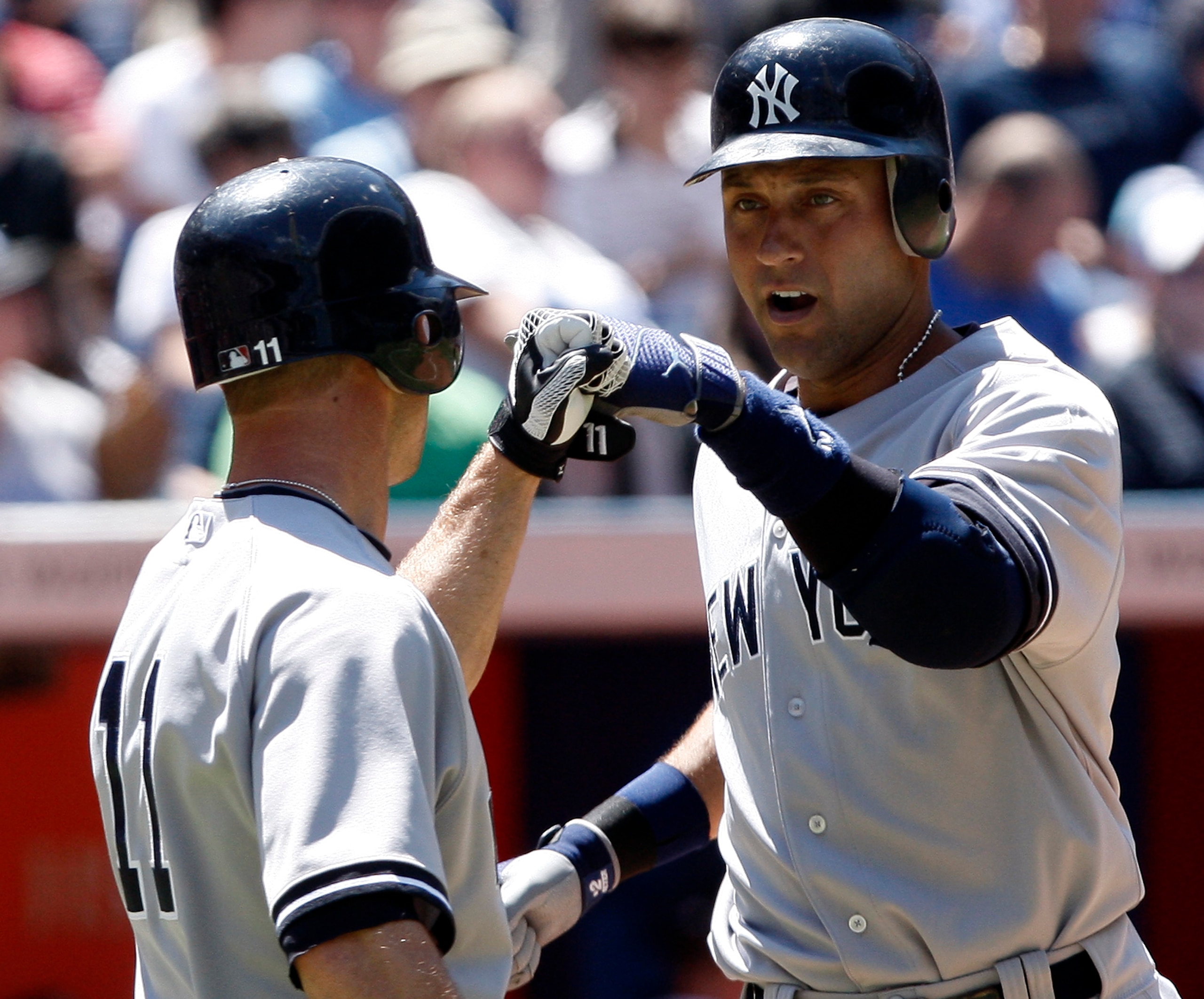 TORONTO - JUNE 5:  Derek Jeter #2 is congratulated after a home run by Brett Gardner #11 of the New York Yankees at the Rogers Centre during a MLB game against the Toronto Blue Jays June 5, 2010 in Toronto, Ontario, Canada. (Photo by Abelimages/Getty Imag
