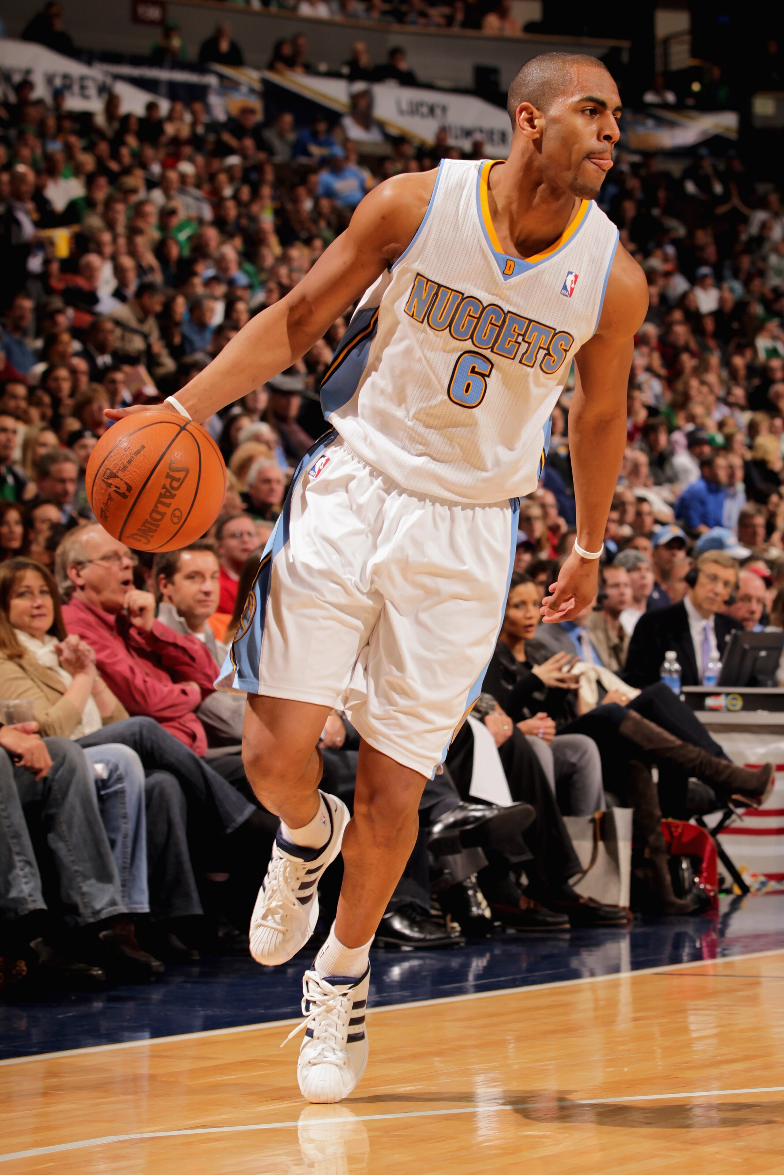 DENVER, CO - FEBRUARY 24: Arron Afflalo #6 of the Denver Nuggets conttrols the ball against the Boston Celtics during NBA action at the Pepsi Center on February 24, 2011 in Denver, Colorado. The Nuggets defeated the Celtics 89-75. NOTE TO USER: User expr DENVER, CO - FEBRUARY 24: Arron Afflalo #6 of the Denver Nuggets conttrols the ball against the Boston Celtics during NBA action at the Pepsi Center on February 24, 2011 in Denver, Colorado. The Nuggets defeated the Celtics 89-75. NOTE TO USER: User expr