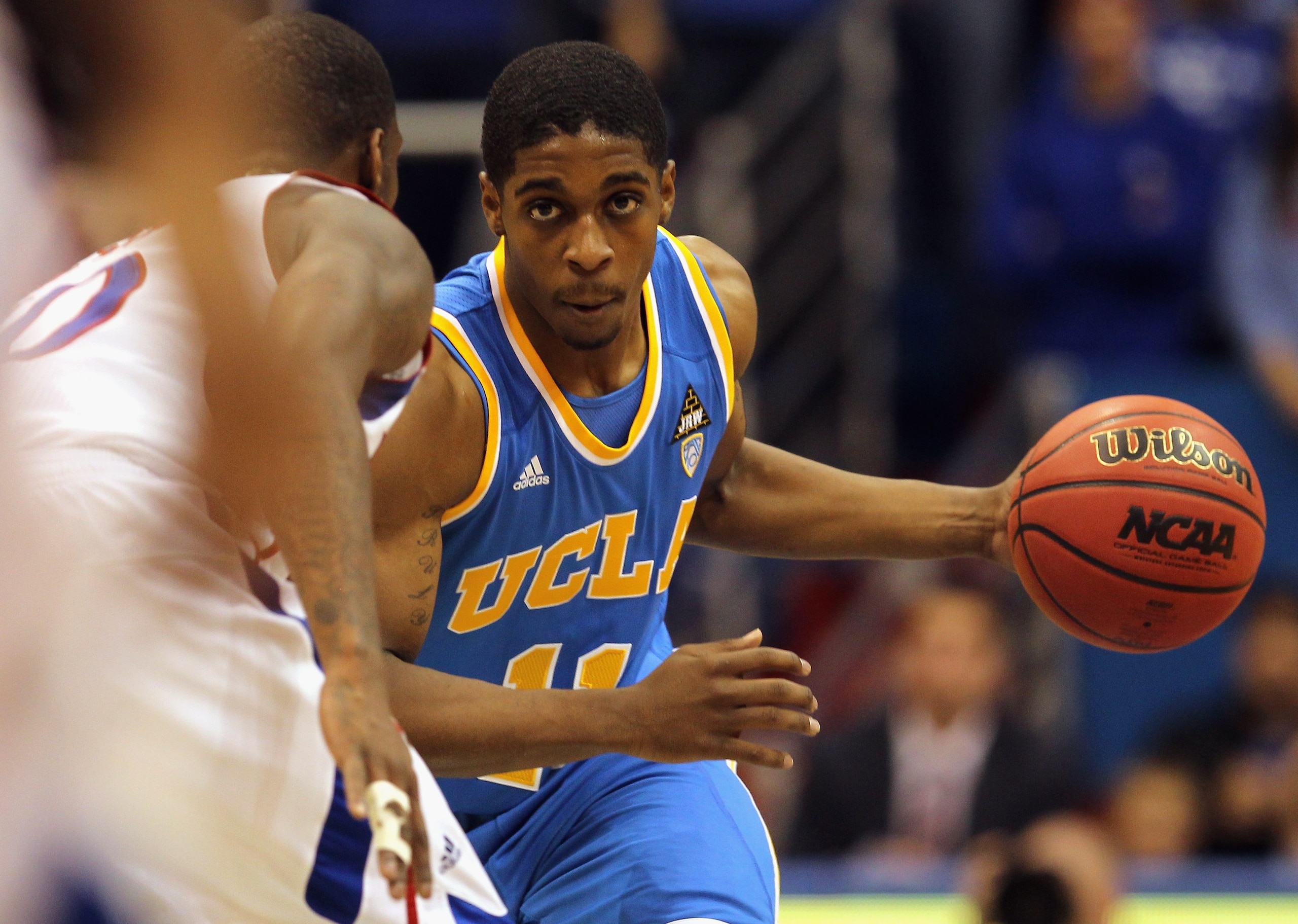 LAWRENCE, KS - DECEMBER 02:  Lazeric Jones #11 of the UCLA Bruins in action during the game against the Kansas Jayhawks on December 2, 2010 at Allen Fieldhouse in Lawrence, Kansas.  (Photo by Jamie Squire/Getty Images)