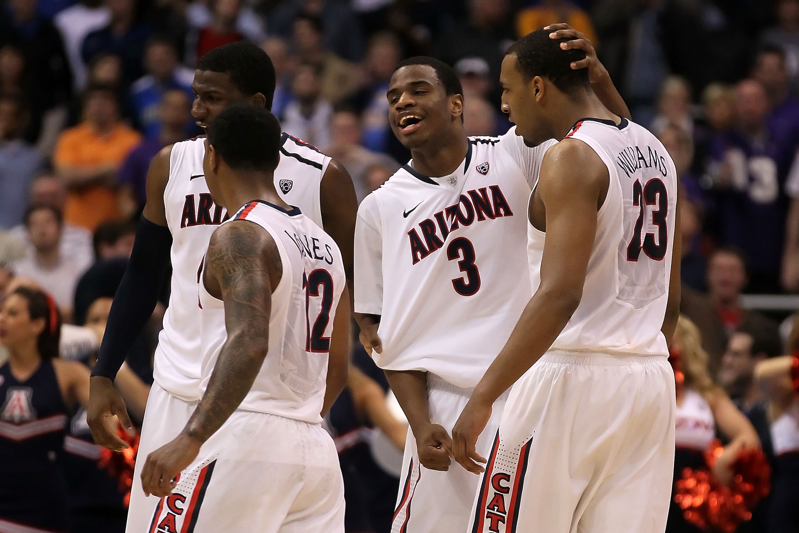LOS ANGELES, CA - MARCH 12:  (R-L) Derrick Williams #23 and Kevin Parrom #3 of the Arizona Wildcats react alongside teammates Lamont Jones #12 and Solomon Hill #44 while taking on the Washington Huskies in the championship game of the 2011 Pacific Life Pa