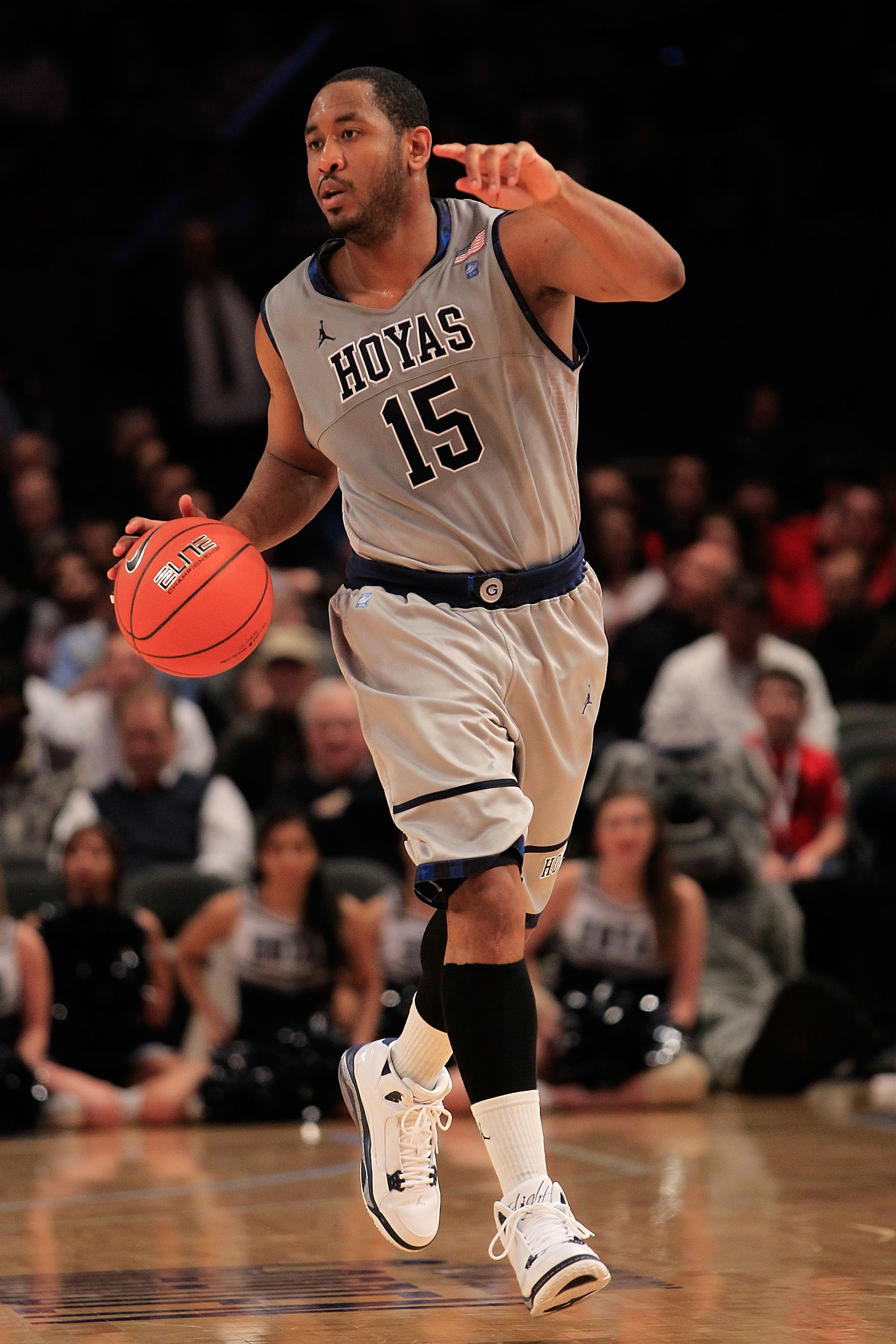 NEW YORK, NY - MARCH 09: Austin Freeman #15 of the Georgetown Hoyas dribbles the ball against the Connecticut Huskies during the second round of the 2011 Big East Men's Basketball Tournament presented by American Eagle Outfitters at Madison Square Garden