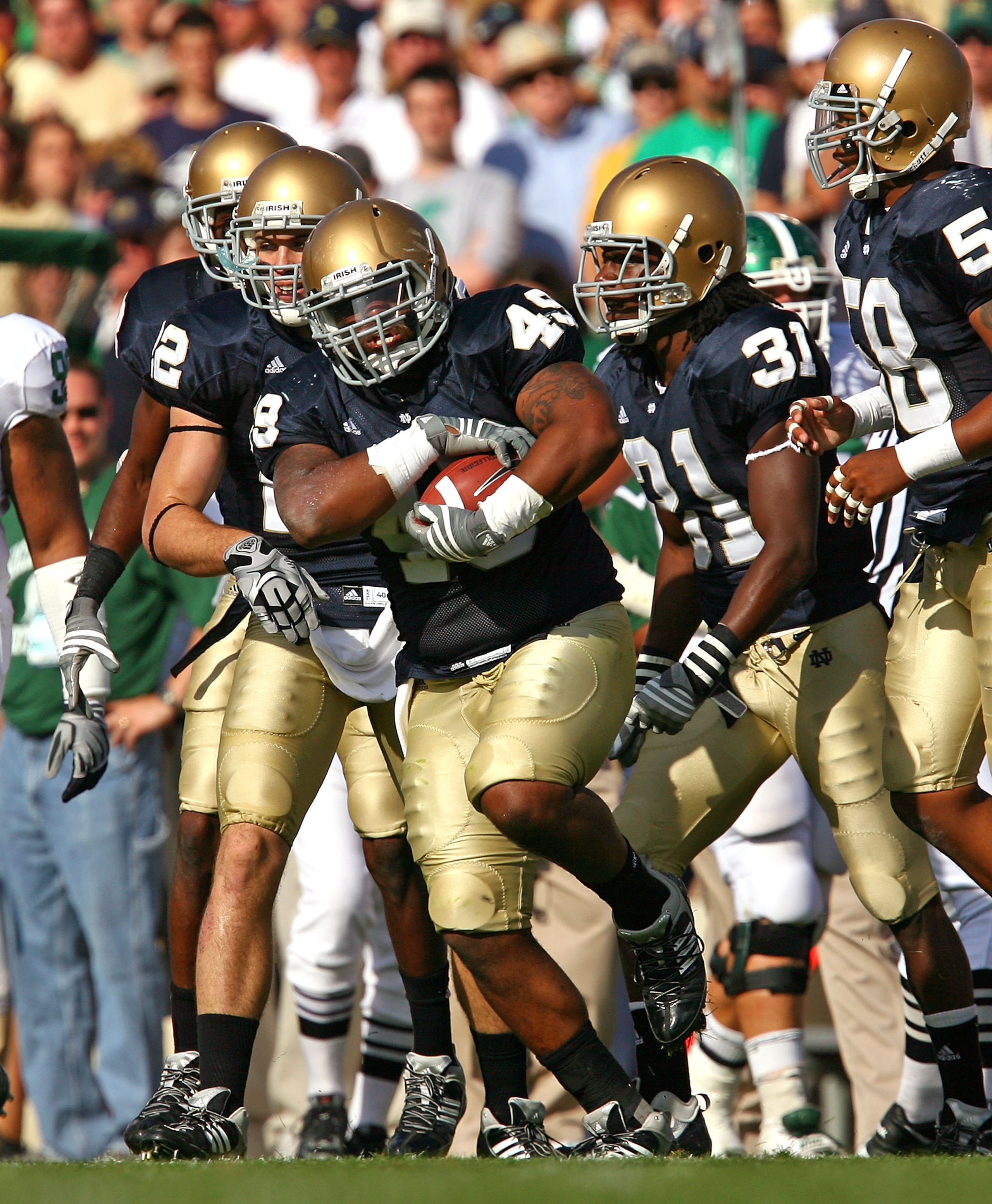 SOUTH BEND, IN - SETPEMBER 19: Steve Filer #46 of the Notre Dame Fighting Irish celebrates recovering a fumble against the Michigan State Spartans on September 19, 2009 at Notre Dame Stadium in South Bend, Indiana. (Photo by Jonathan Daniel/Getty Images)
