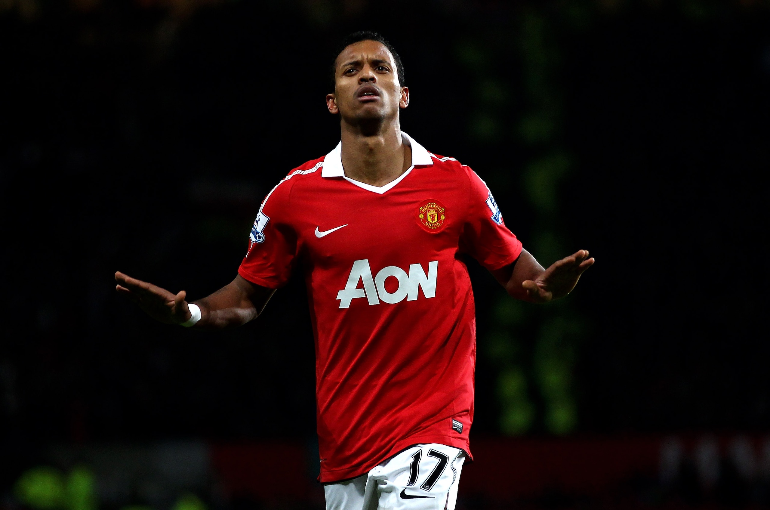 MANCHESTER, ENGLAND - JANUARY 04:   Nani of Manchester United celebrates scoring his team's second goal during the Barclays Premier League match between Manchester United and Stoke City at Old Trafford on January 4, 2011 in Manchester, England. (Photo by