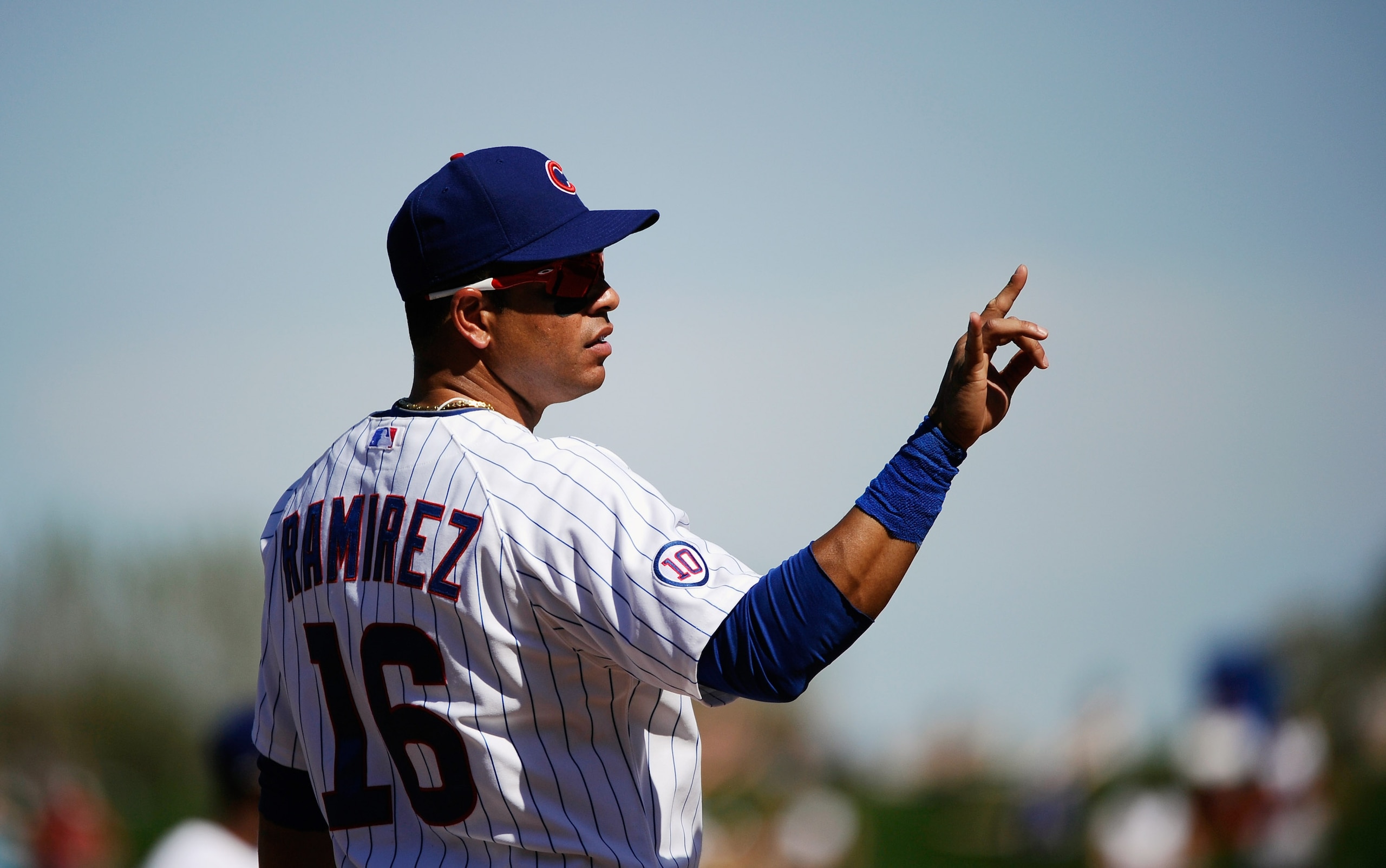 MESA, AZ - MARCH 09:  Aramis Ramirez #16 of the Chicago Cubs signals two outs during the spring training baseball game against the Kansas City Royals at HoHoKam Stadium on March 9, 2011 in Mesa, Arizona.  (Photo by Kevork Djansezian/Getty Images)