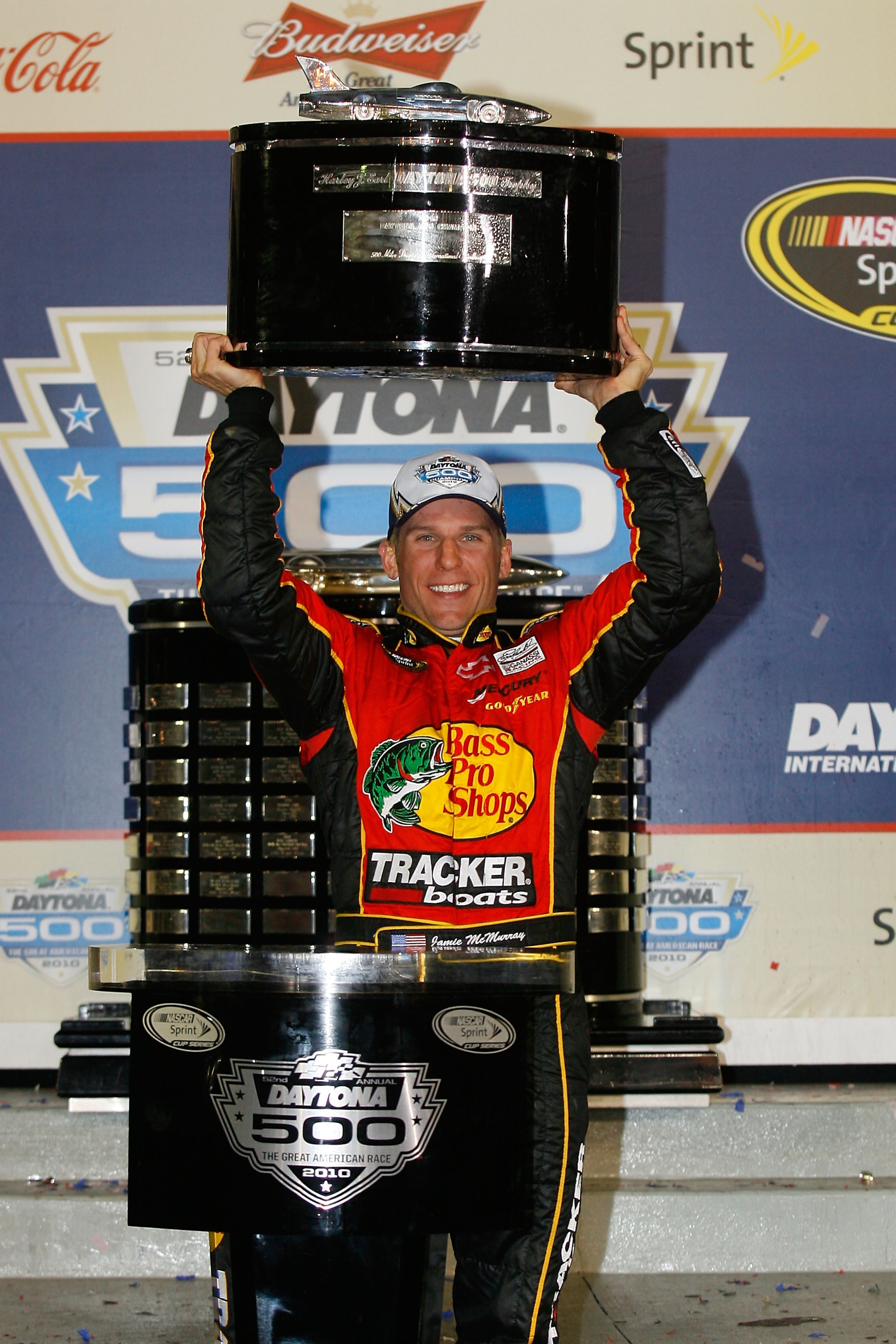 DAYTONA BEACH, FL - FEBRUARY 14:  Jamie McMurray, driver of the #1 Bass Pro Shops/Tracker Boats Chevrolet, celebrates in Victory Lane after winning the NASCAR Sprint Cup Series Daytona 500 at Daytona International Speedway on February 14, 2010 in Daytona