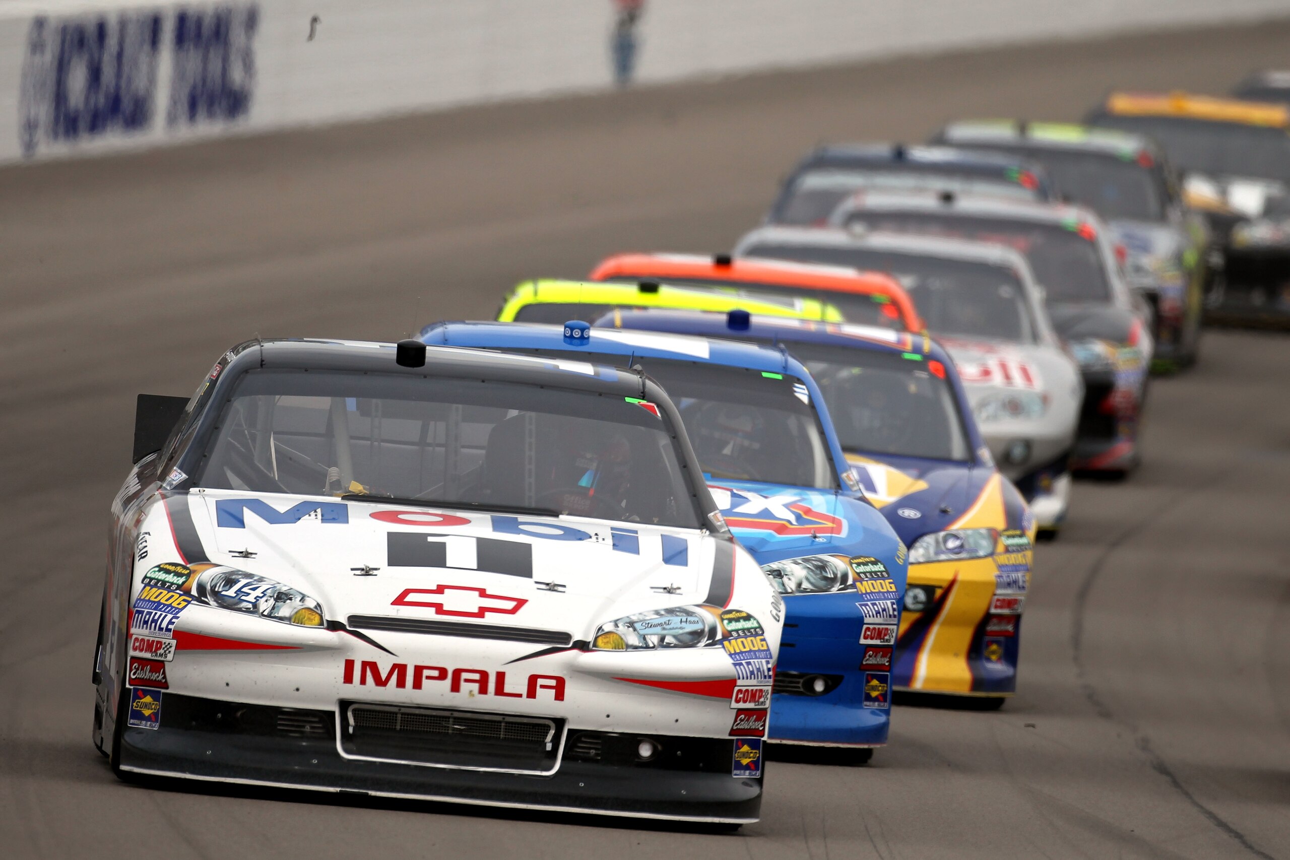LAS VEGAS, NV - MARCH 06:  Tony Stewart, driver of the #14 Mobil 1/Office Depot Chevrolet, leads the field during the NASCAR Sprint Cup Series Kobalt Tools 400 at Las Vegas Motor Speedway on March 6, 2011 in Las Vegas, Nevada.  (Photo by Jonathan Ferrey/G