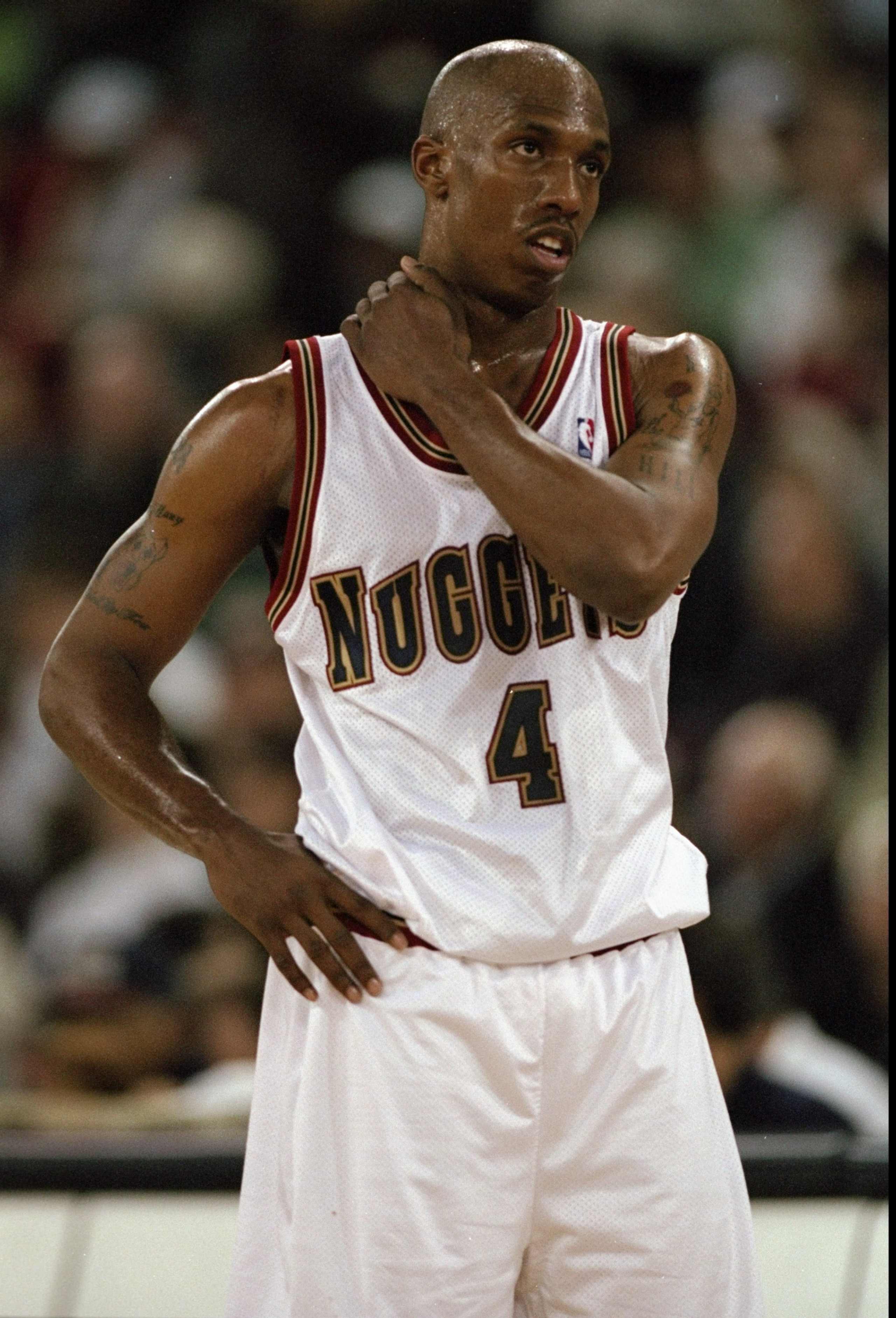 17 Mar 1999:  Chauncey Billups #4 of the Denver Nuggets looking on during the game against the Houston Rockets at the McNichols Arena in Denver, Colorado. The Rockets defeated the Nuggets 114-103.   Mandatory Credit: Brian Bahr  /Allsport