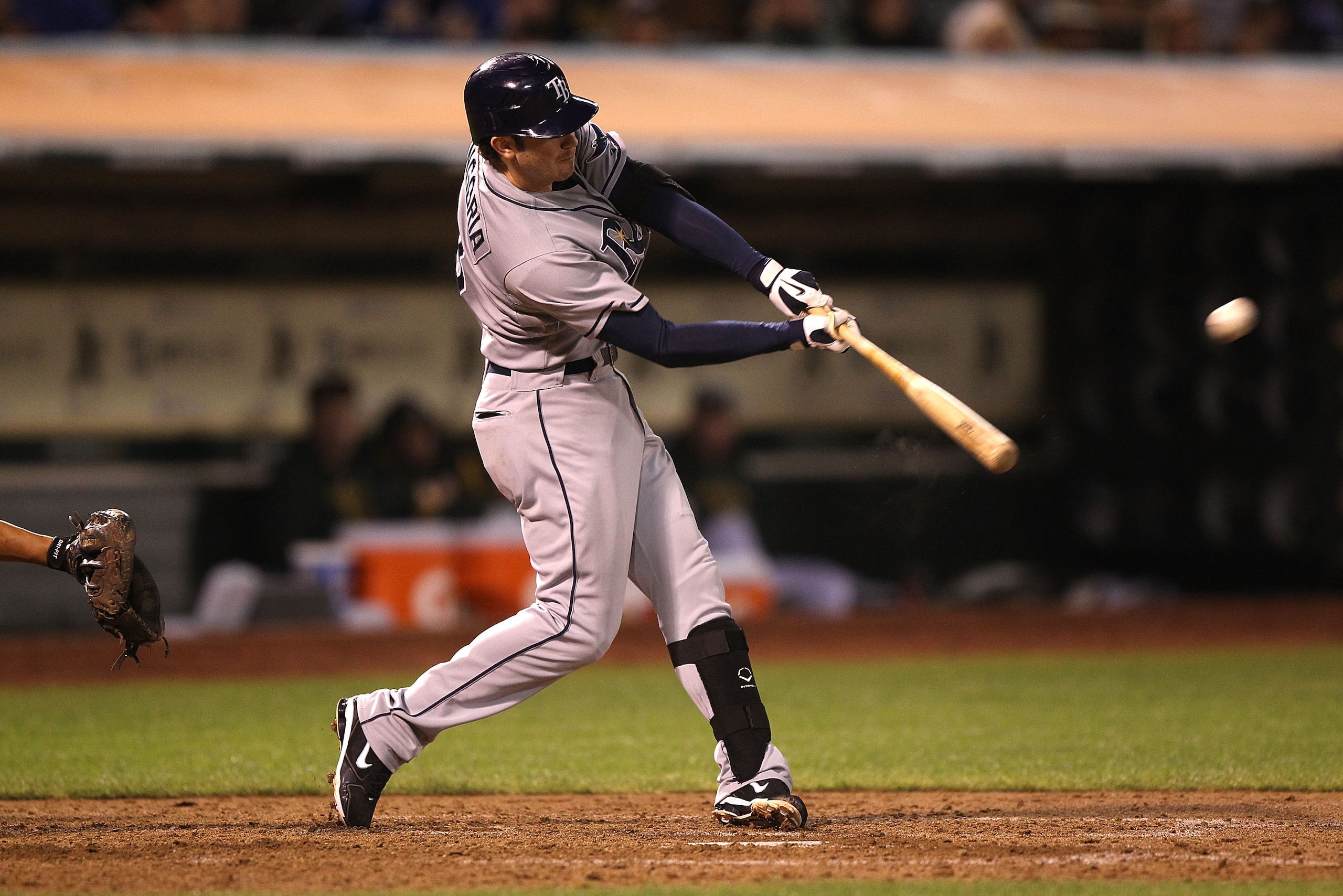 OAKLAND, CA - AUGUST 19:  Evan Longoria #3 of the Tampa Bay Rays hits a solo home run against the Oakland Athletics in the sixth inning during an MLB game at the Oakland-Alameda County Coliseum on August 19, 2010 in Oakland, California.  (Photo by Jed Jac