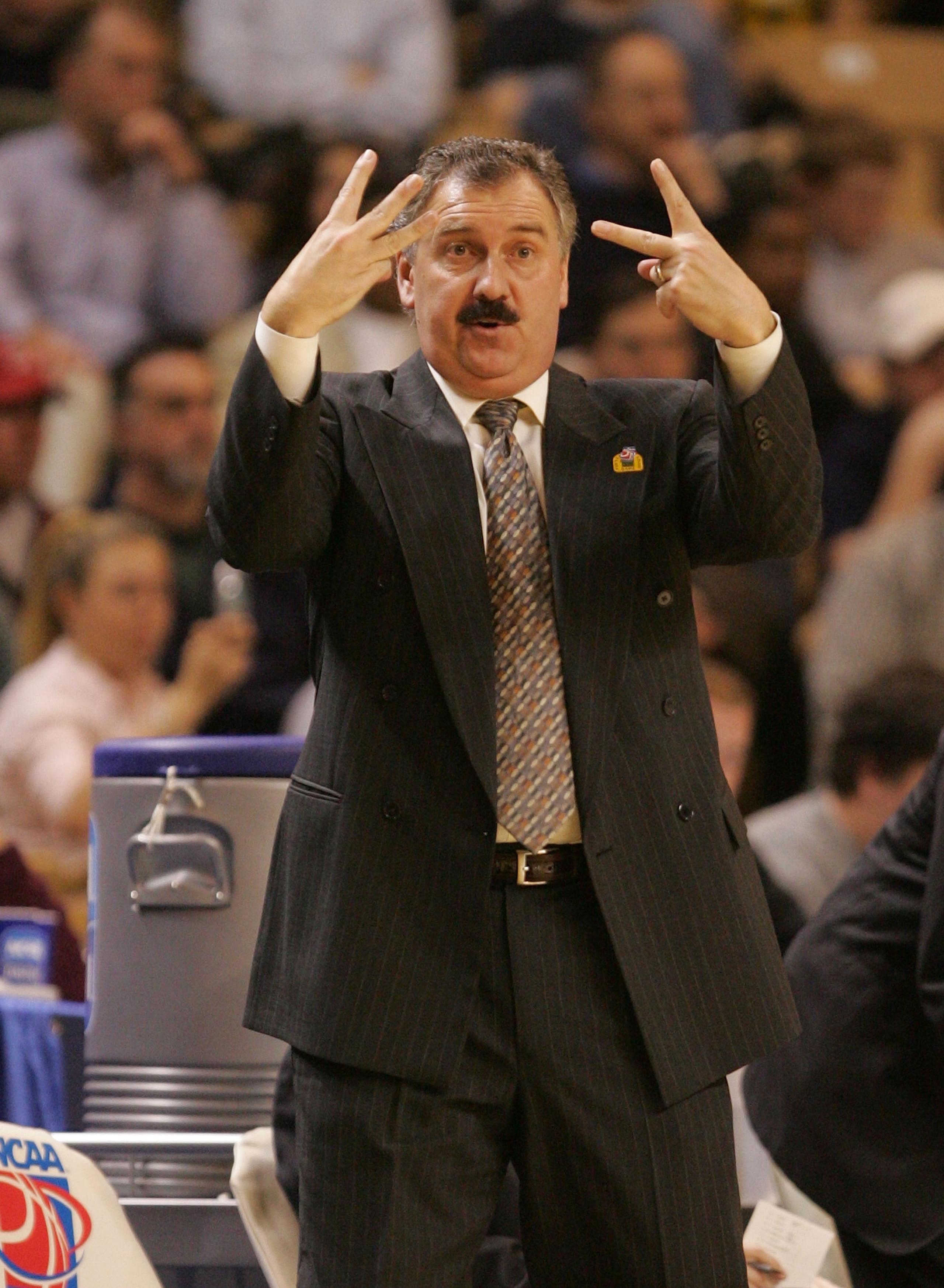 WORCESTER, MA - MARCH 18:  Coach Blaine Taylor of the Old Dominion Monarchs signals his players during a game against the Michigan State Spartans in the first round of the NCAA Men's Basketball Championship at the DCU Center March 18, 2005 in Worcester, M