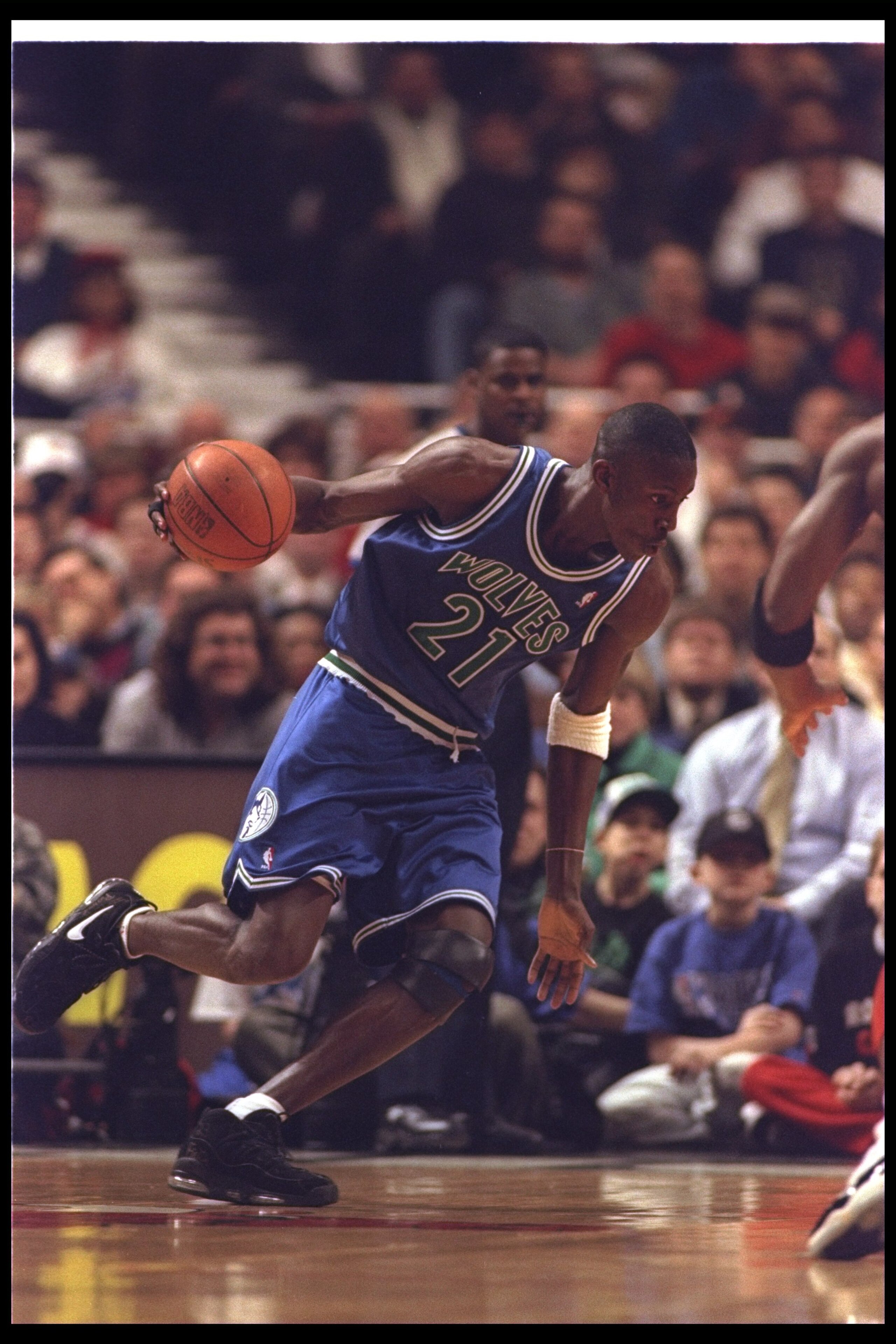 27 Feb 1996: Forward Kevin Garnett of the Minnesota Timberwolves moves the ball during a game against the Chicago Bulls at the United Center in Chicago, Illinois. The Bulls won the game, 120-99.