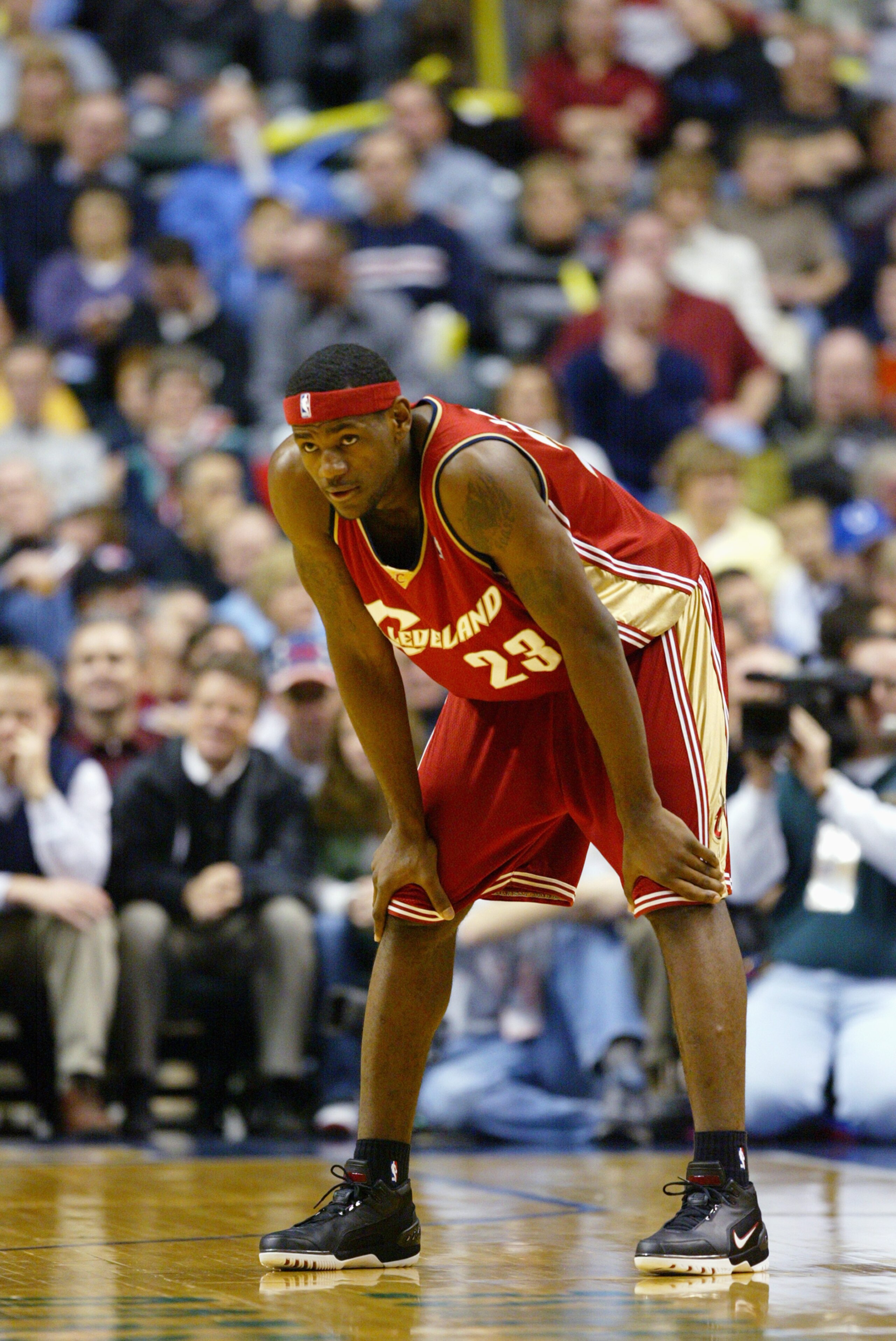 INDIANAPOLIS - DECEMBER 15:  LeBron James #23 of the Cleveland Cavaliers leans over on the court during the game against the Indiana Pacers at Conseco Fieldhouse on December 15, 2003 in Indianapolis, Indiana.  The Pacers won 95-85.  NOTE TO USER: User exp