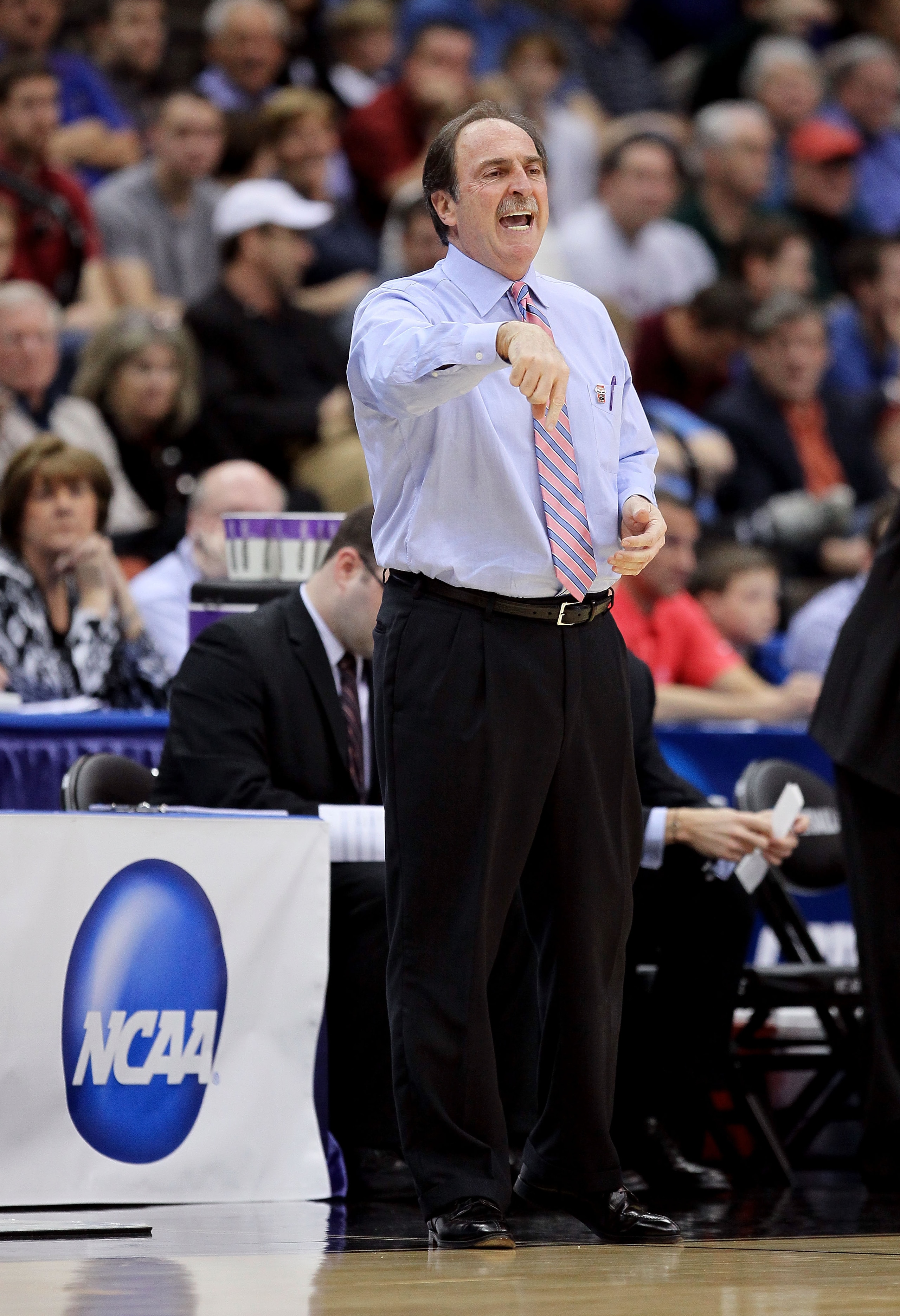 JACKSONVILLE, FL - MARCH 19:  Head coach Fran Dunphy of the Temple Owls calls out a play while taking on the Cornell Big Red during the first round of the 2010 NCAA men's basketball tournament at Jacksonville Veteran's Memorial Arena on March 19, 2010 in