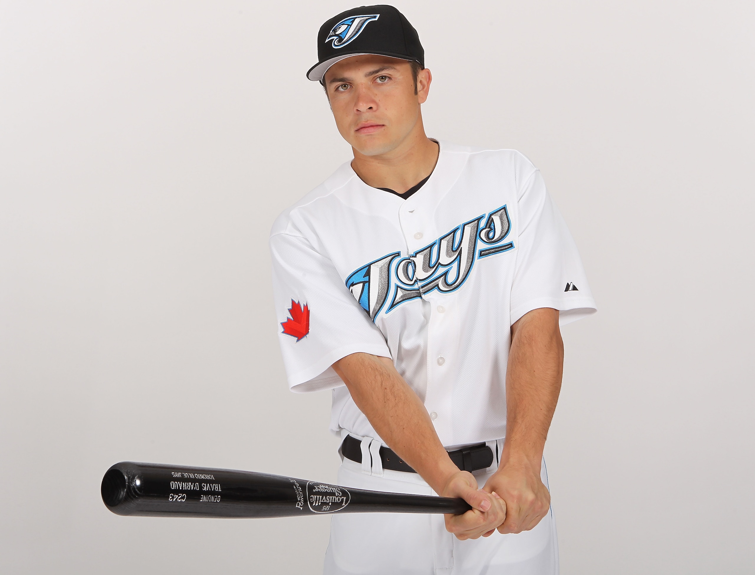 DUNEDIN, FL - FEBRUARY 20:  Travis d'Arnaud #15 of the Toronto Blue Jays poses during photo day at Florida Auto Exchange Stadium on February 20, 2011 in Dunedin, Florida.  (Photo by Nick Laham/Getty Images)
