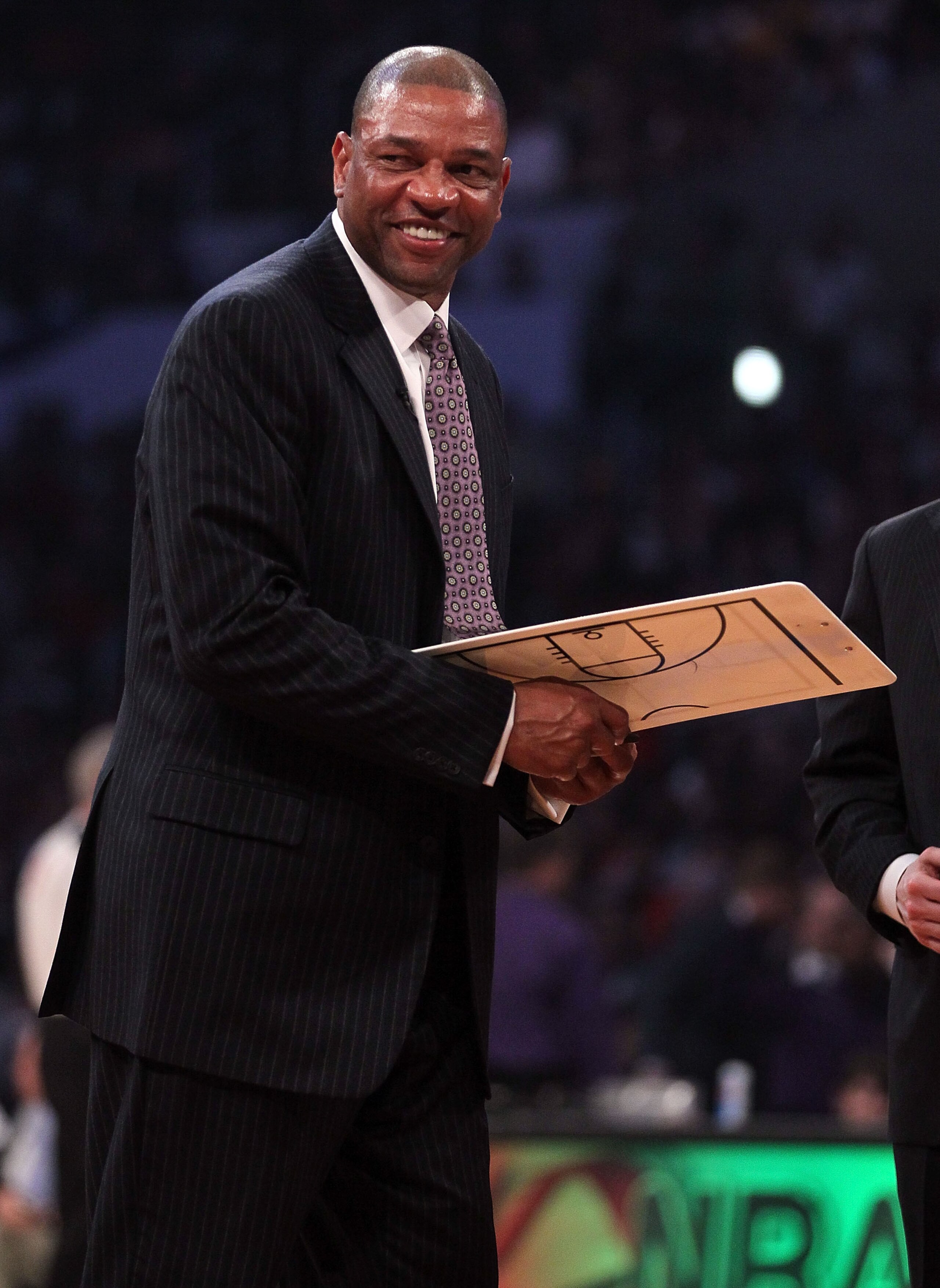 LOS ANGELES, CA - FEBRUARY 20:  Head coach Doc Rivers of the Eastern Conference smiles in the 2011 NBA All-Star Game at Staples Center on February 20, 2011 in Los Angeles, California. NOTE TO USER: User expressly acknowledges and agrees that, by downloadi