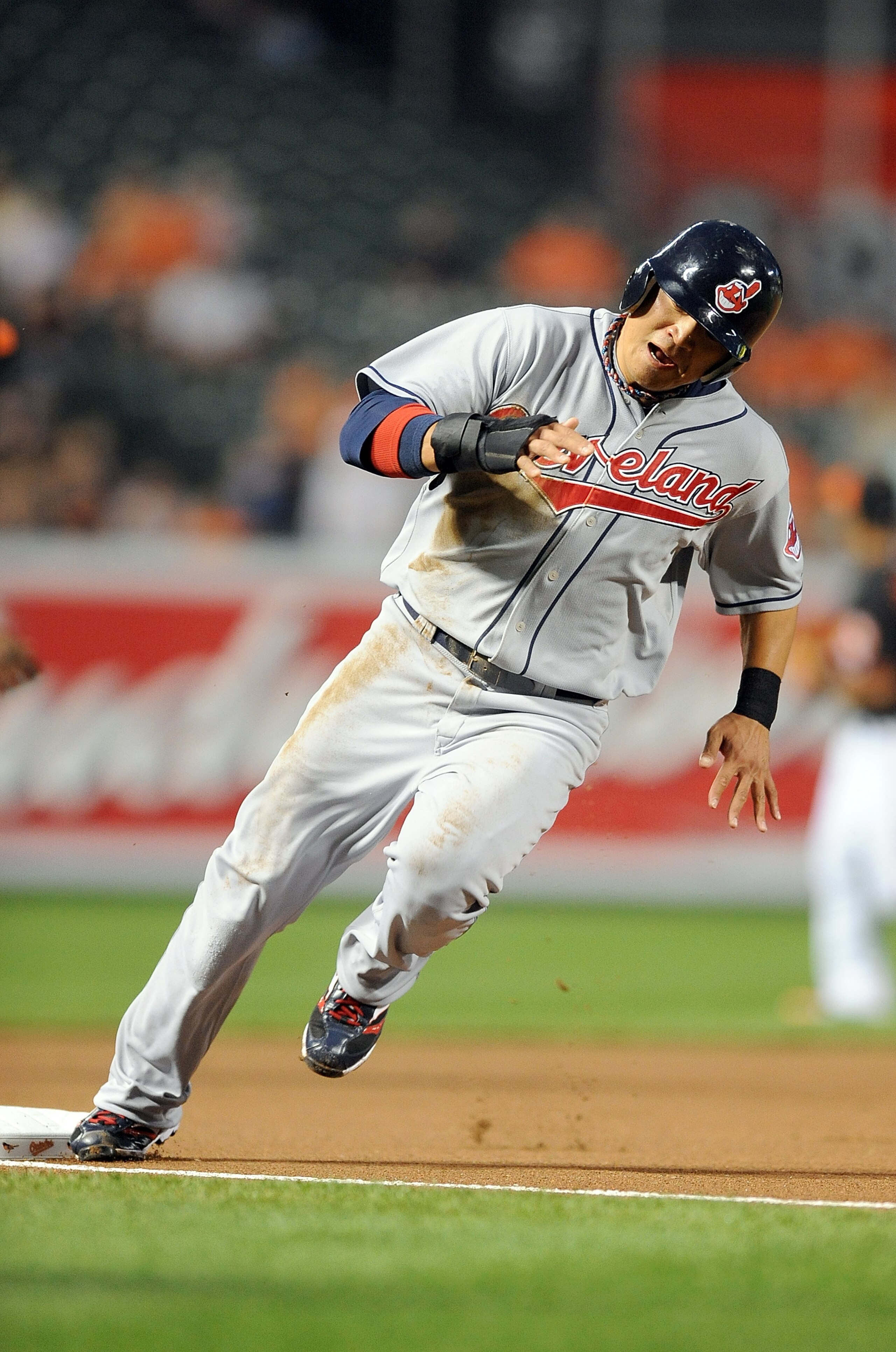 BALTIMORE - MAY 14:  Shin-Soo Choo #17 of the Cleveland Indians rounds third base and scores in the first inning against the Baltimore Orioles at Camden Yards on May 14, 2010 in Baltimore, Maryland.  (Photo by Greg Fiume/Getty Images)