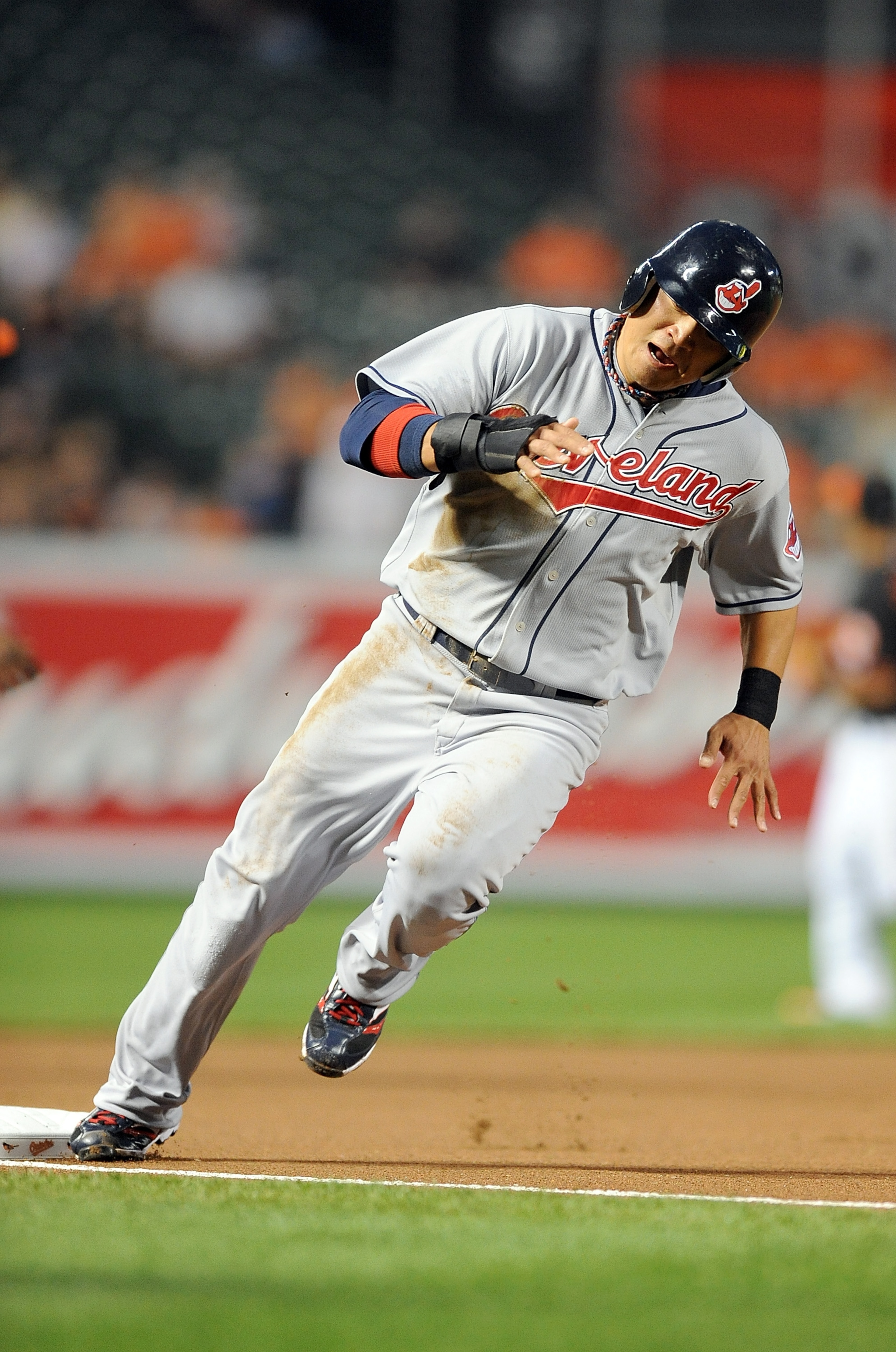 BALTIMORE - MAY 14:  Shin-Soo Choo #17 of the Cleveland Indians rounds third base and scores in the first inning against the Baltimore Orioles at Camden Yards on May 14, 2010 in Baltimore, Maryland.  (Photo by Greg Fiume/Getty Images)