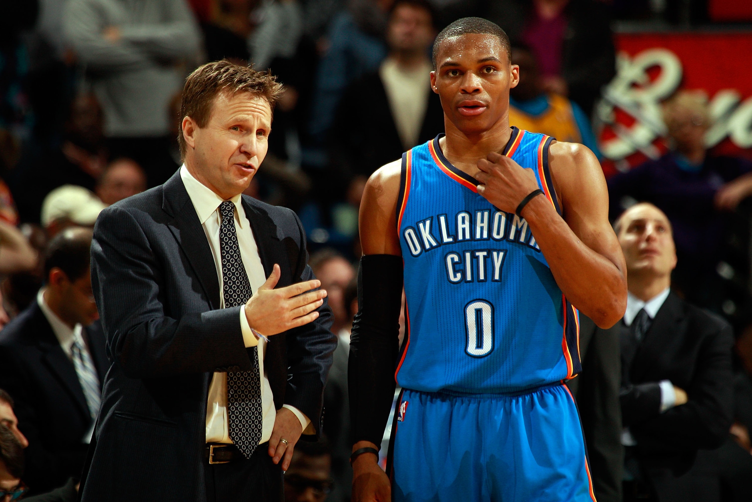 NEW ORLEANS, LA - DECEMBER 10:  Head coach Scott Brooks talks with Russell Westbrook #0 of the Oklahoma City Thunder during the game against the New Orleans Hornets at New Orleans Arena on December 10, 2010 in New Orleans, Louisiana.    NOTE TO USER: User