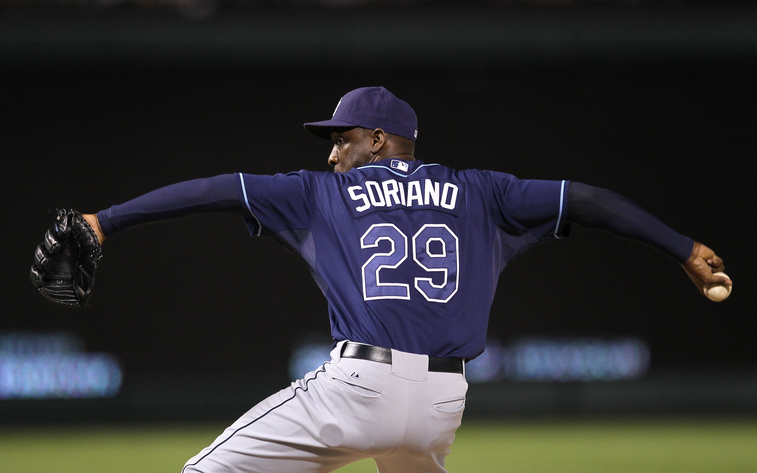 ARLINGTON, TX - OCTOBER 9:  Rafael Soriano #29 of the Tampa Bay Rays throws a pitch against the Texas Rangers during game three of the ALDS at Rangers Ballpark in Arlington on October 9, 2010 in Arlington, Texas.  The Rays won 6-3.  (Photo by Stephen Dunn