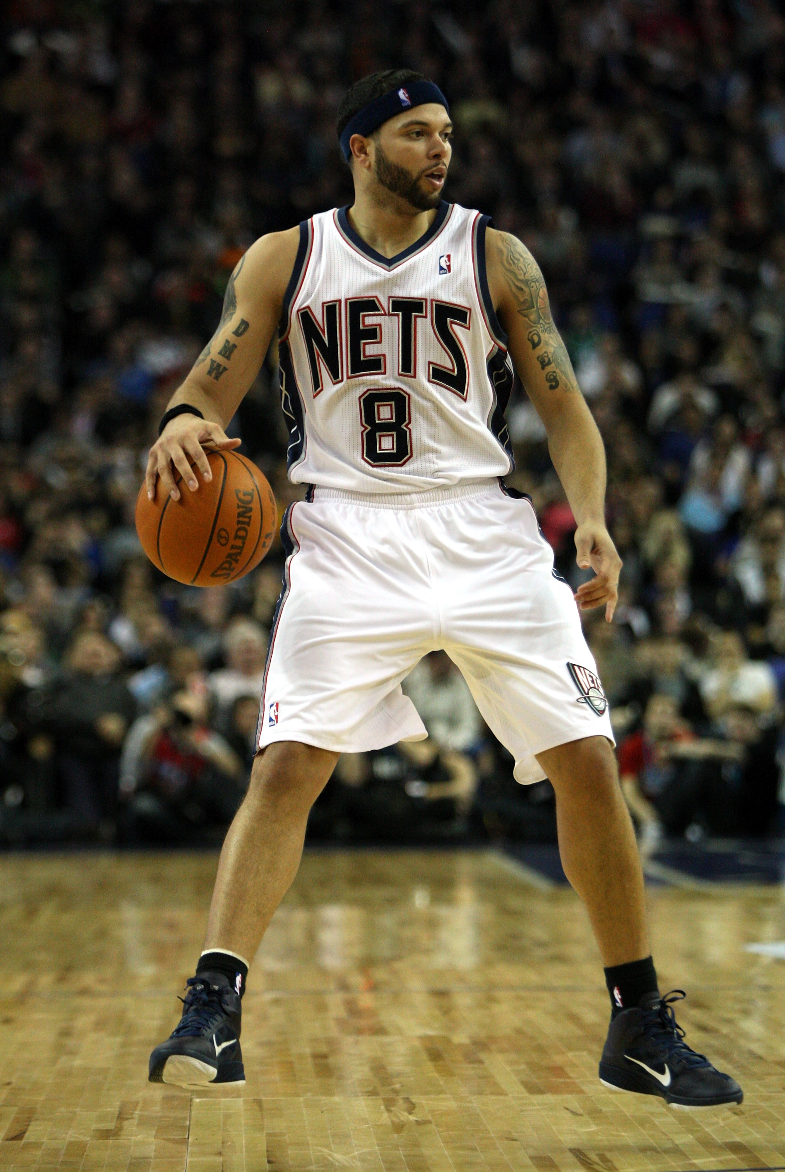 LONDON, ENGLAND - MARCH 04:  #8 Deron Williams of the Nets in action during the NBA match between New Jersey Nets and the Toronto Raptors at the O2 Arena on March 4, 2011 in London, England. NOTE TO USER: User expressly acknowledges and agrees that, by do