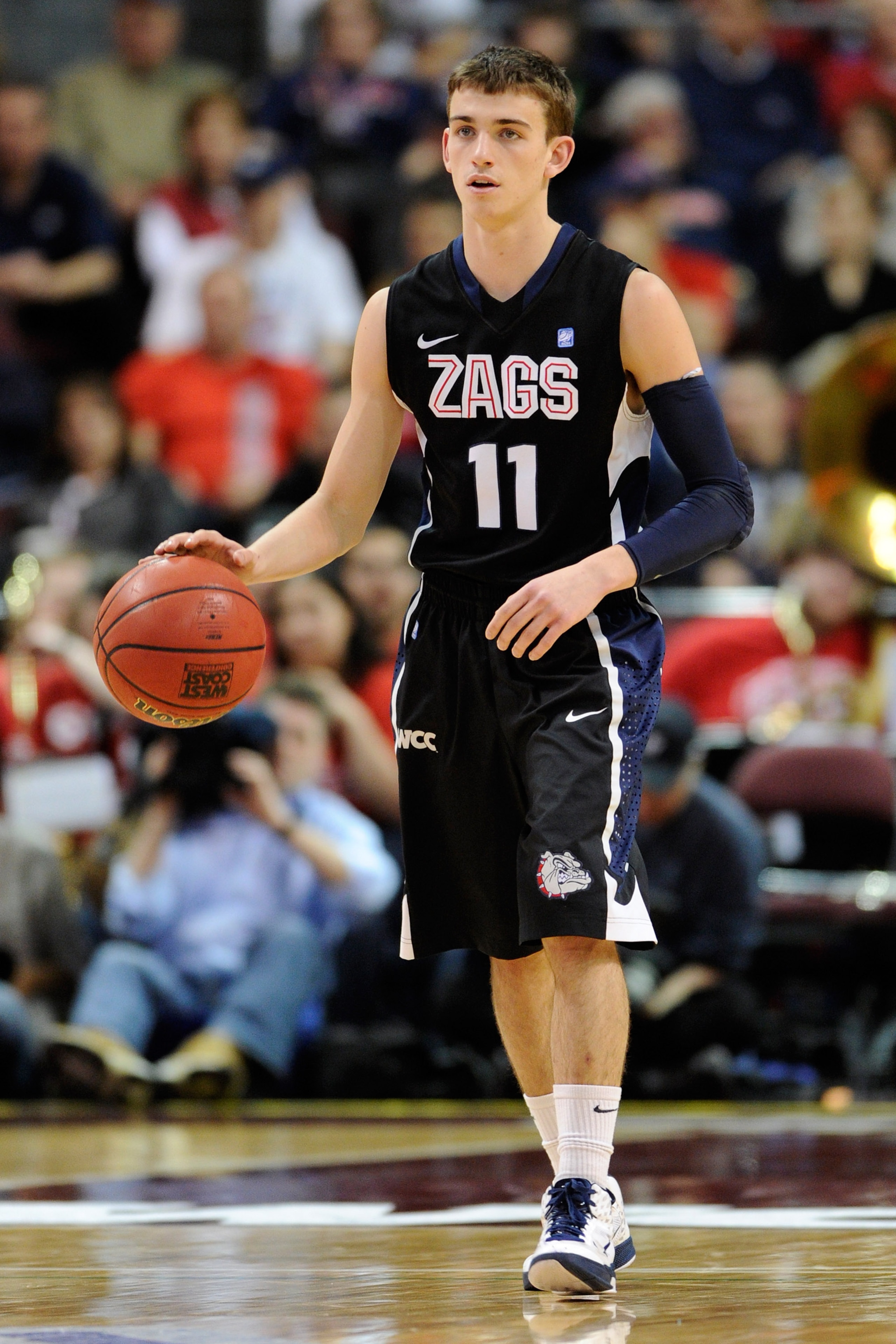 LAS VEGAS, NV - MARCH 07:  David Stockton #11 of the Gonzaga Bulldogs brings the ball up the court against the Saint Mary's Gaels during the championship game of the Zappos.com West Coast Conference Basketball tournament at the Orleans Arena March 7, 2011