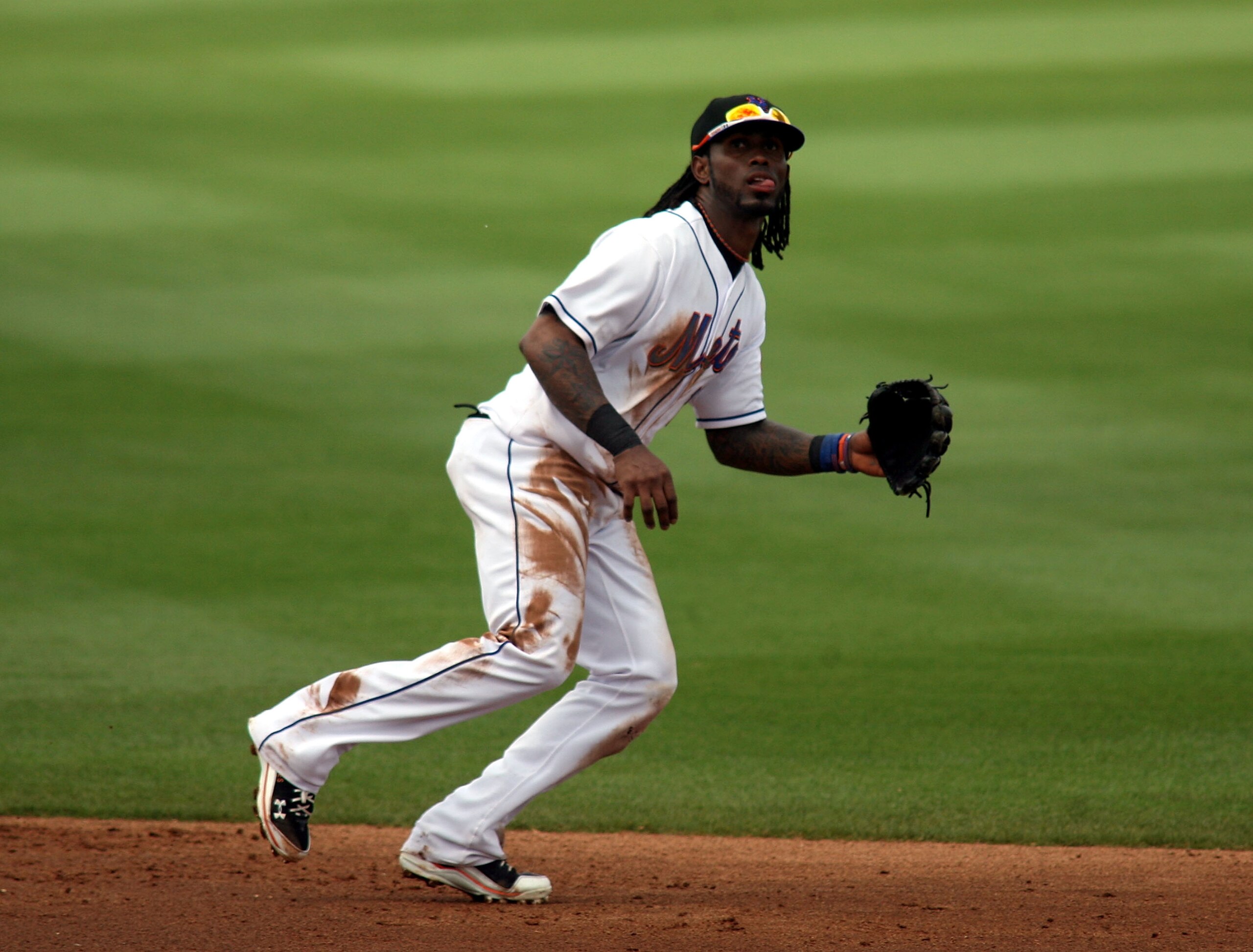 PORT ST. LUCIE, FL - MARCH 03: Shortstop Jose Reyes #7 of the New York Mets plays the field against the St. Louis Cardinals stealing second base at Digital Domain Park on March 3, 2011 in Port St. Lucie, Florida.  (Photo by Marc Serota/Getty Images)