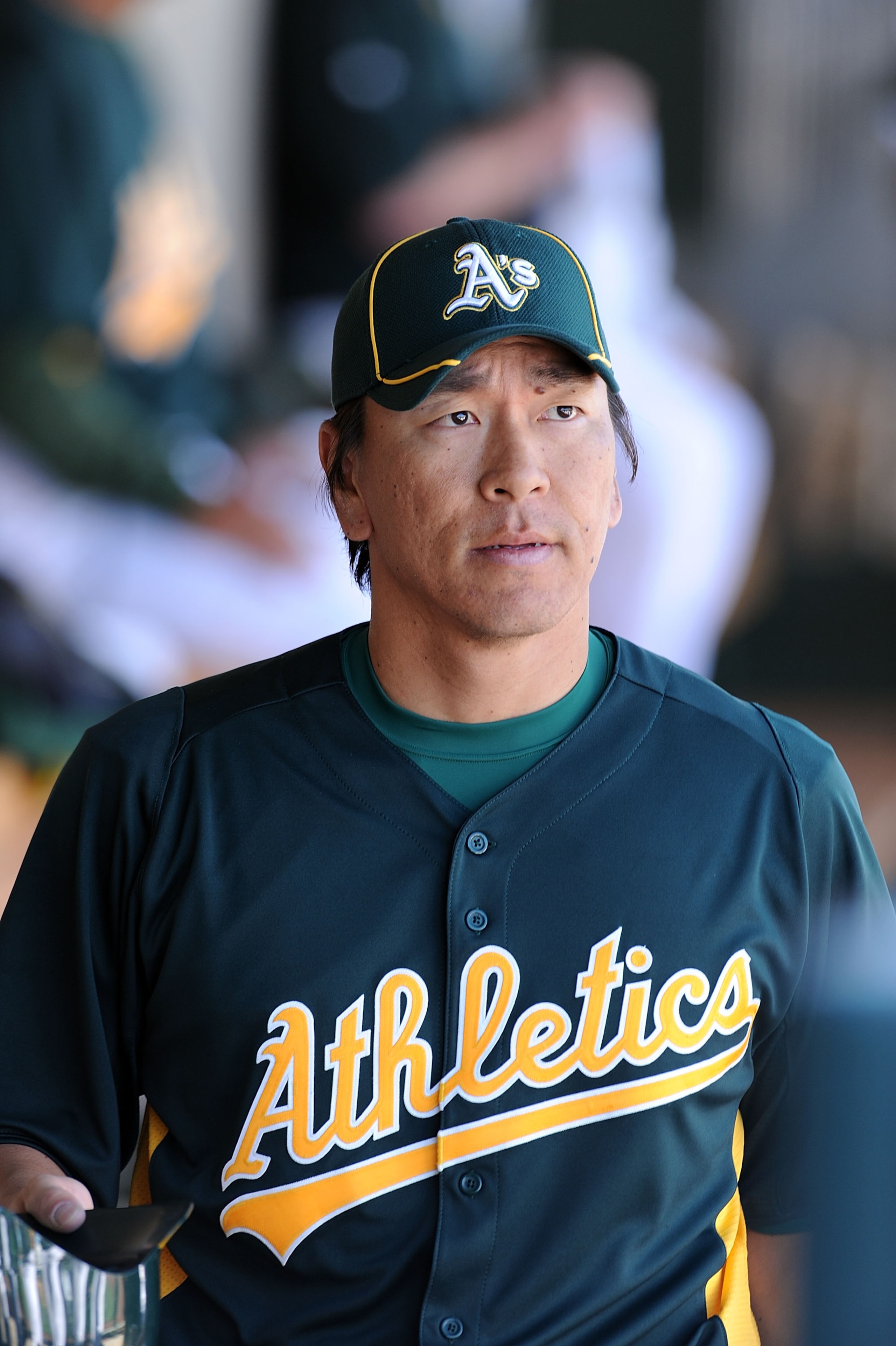 PHOENIX, AZ - MARCH 04:  Hideki Matsui #55 of the Oakland Athletics walks back to the club house after his day is done against the Texas Rangers at Phoenix Municipal Stadium on March 4, 2011 in Phoenix, Arizona.  (Photo by Norm Hall/Getty Images)
