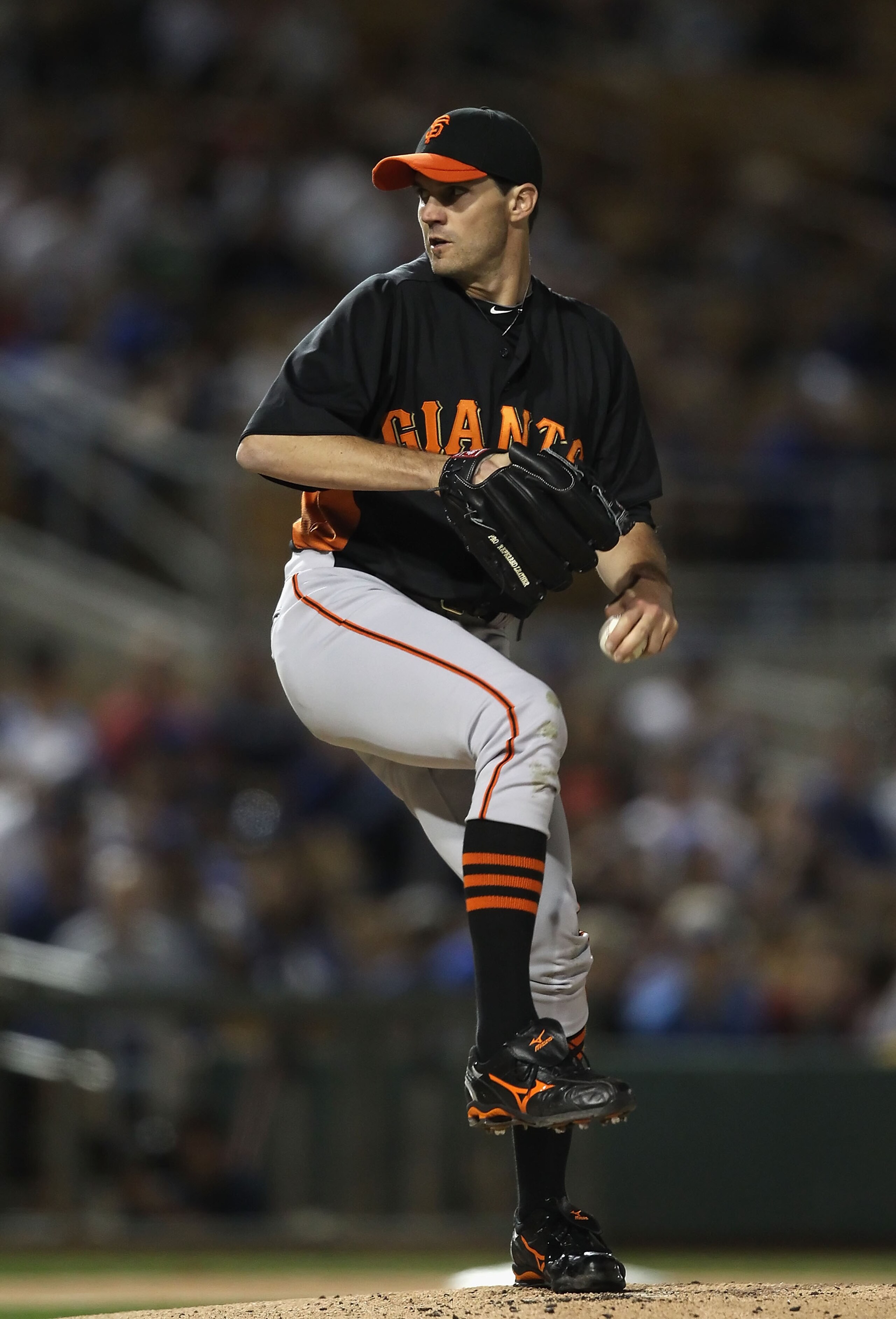 GLENDALE, AZ - MARCH 04:  Starting pitcher Barry Zito #75 of the San Francisco Giants pitches against the Los Angeles Dodgers during the spring training game at Camelback Ranch on March 4, 2011 in Glendale, Arizona.  (Photo by Christian Petersen/Getty Ima