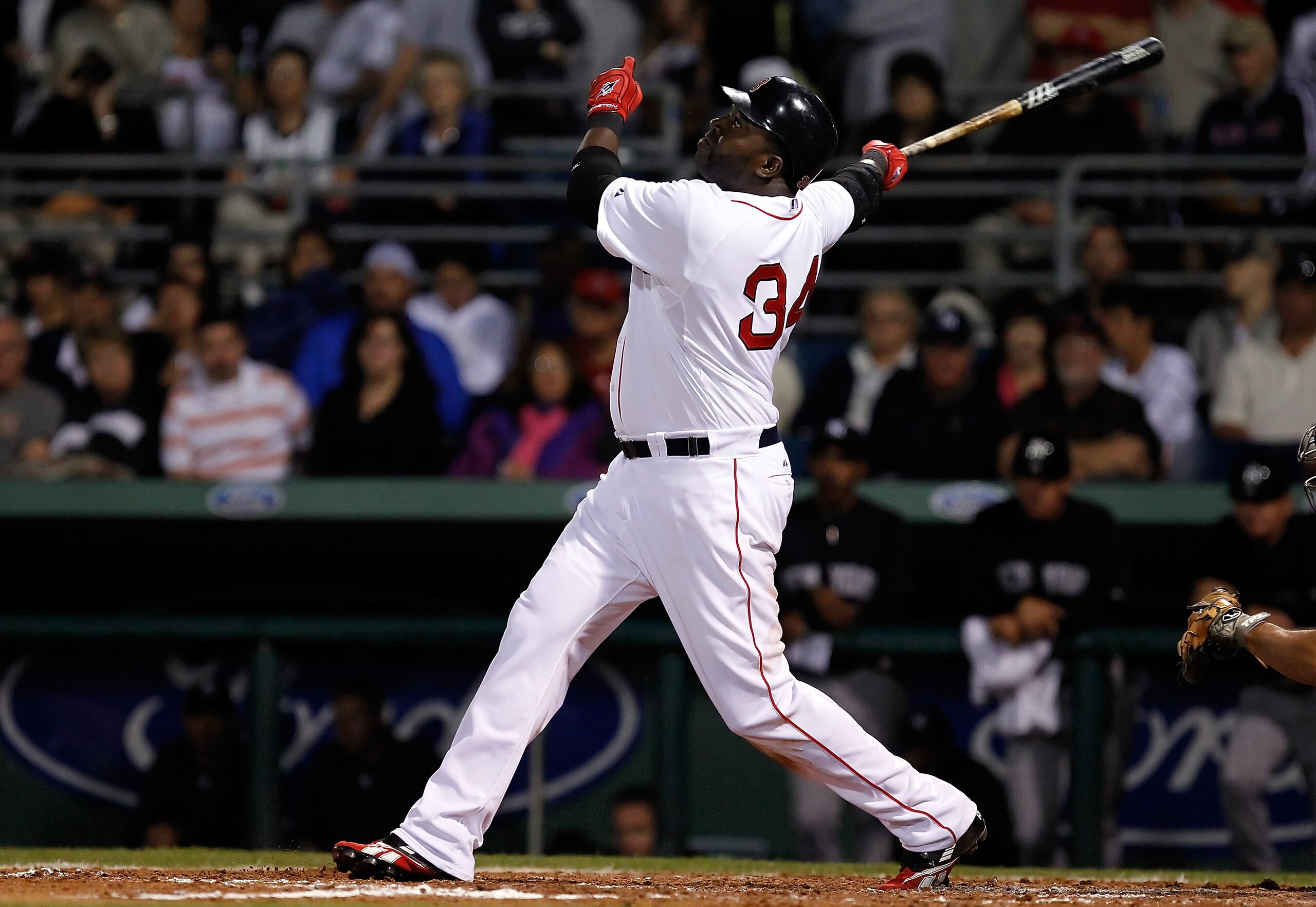 FORT MYERS, FL - MARCH 14:  Designated hitter David Ortiz #34 of the Boston Red Sox fouls off a pitch against the New York Yankees during a Grapefruit League Spring Training Game at City of Palms Park on March 14, 2011 in Fort Myers, Florida.  (Photo by J