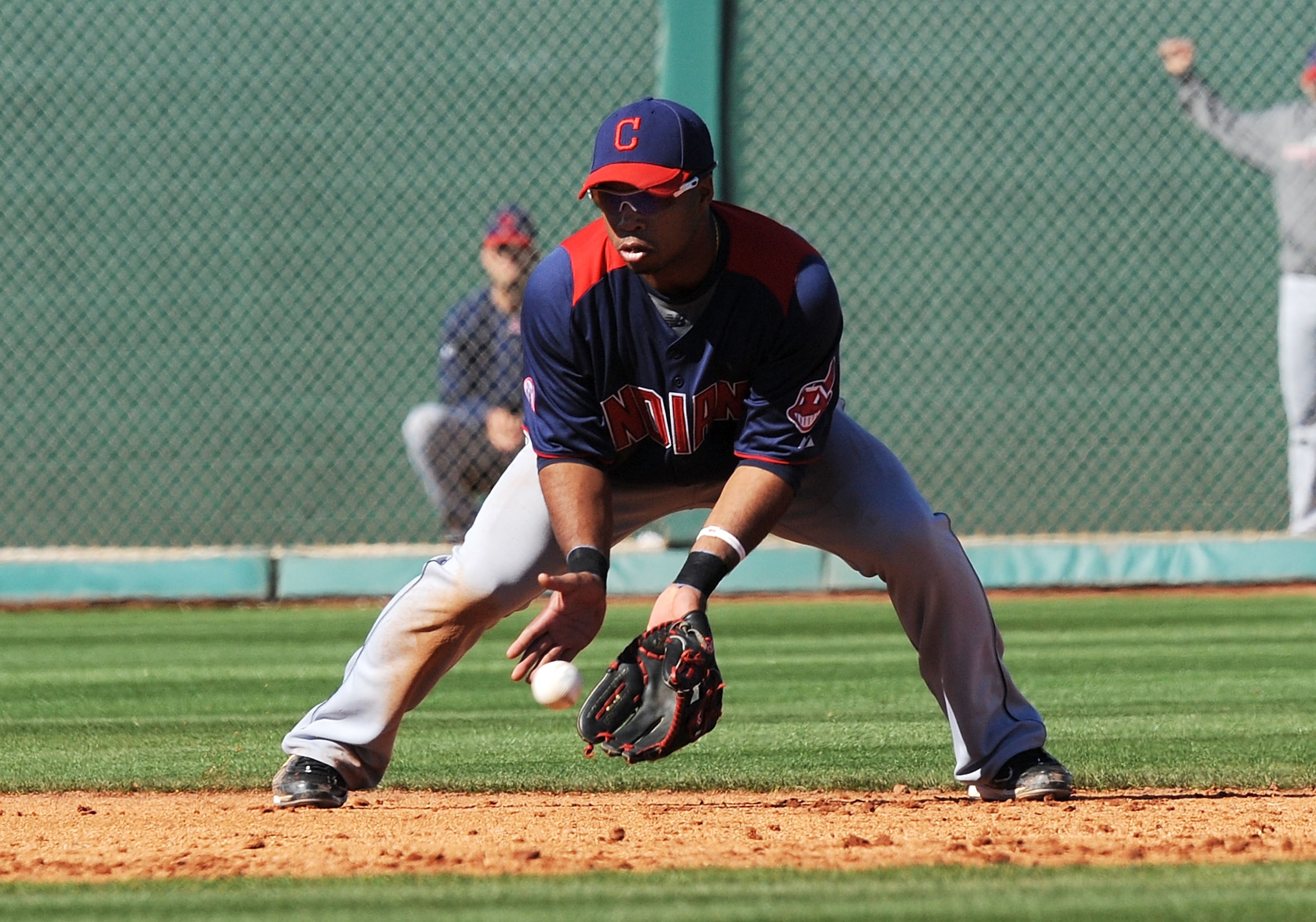 GOODYEAR, AZ - FEBRUARY 28: Luis Valbuena #1 of the Cleveland Indians fields a ground ball against the Cincinnati Reds at Goodyear Ballpark on February 28, 2011 in Goodyear, Arizona. (Photo by Norm Hall/Getty Images) GOODYEAR, AZ - FEBRUARY 28: Luis Valbuena #1 of the Cleveland Indians fields a ground ball against the Cincinnati Reds at Goodyear Ballpark on February 28, 2011 in Goodyear, Arizona. (Photo by Norm Hall/Getty Images)