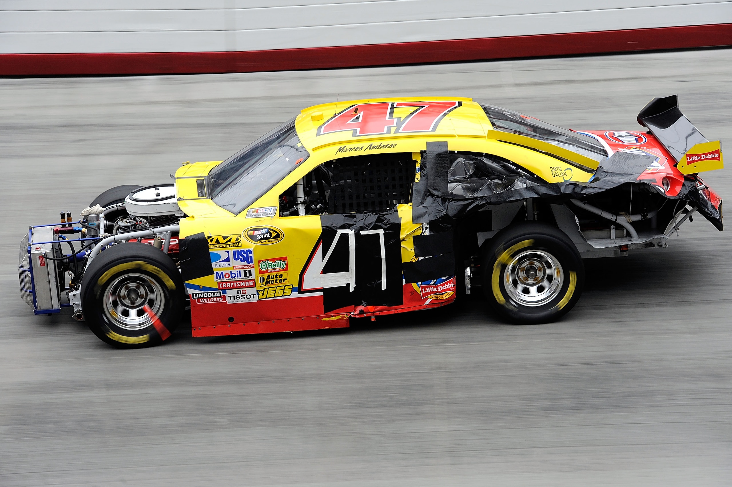 BRISTOL, TN - MARCH 21:  Marcos Amborse drives the #47 Little Debbie Toyota during the NASCAR Sprint Cup Series Food City 500 at Bristol Motor Speedway on March 21, 2010 in Bristol, Tennessee.  (Photo by John Harrelson/Getty Images for NASCAR)