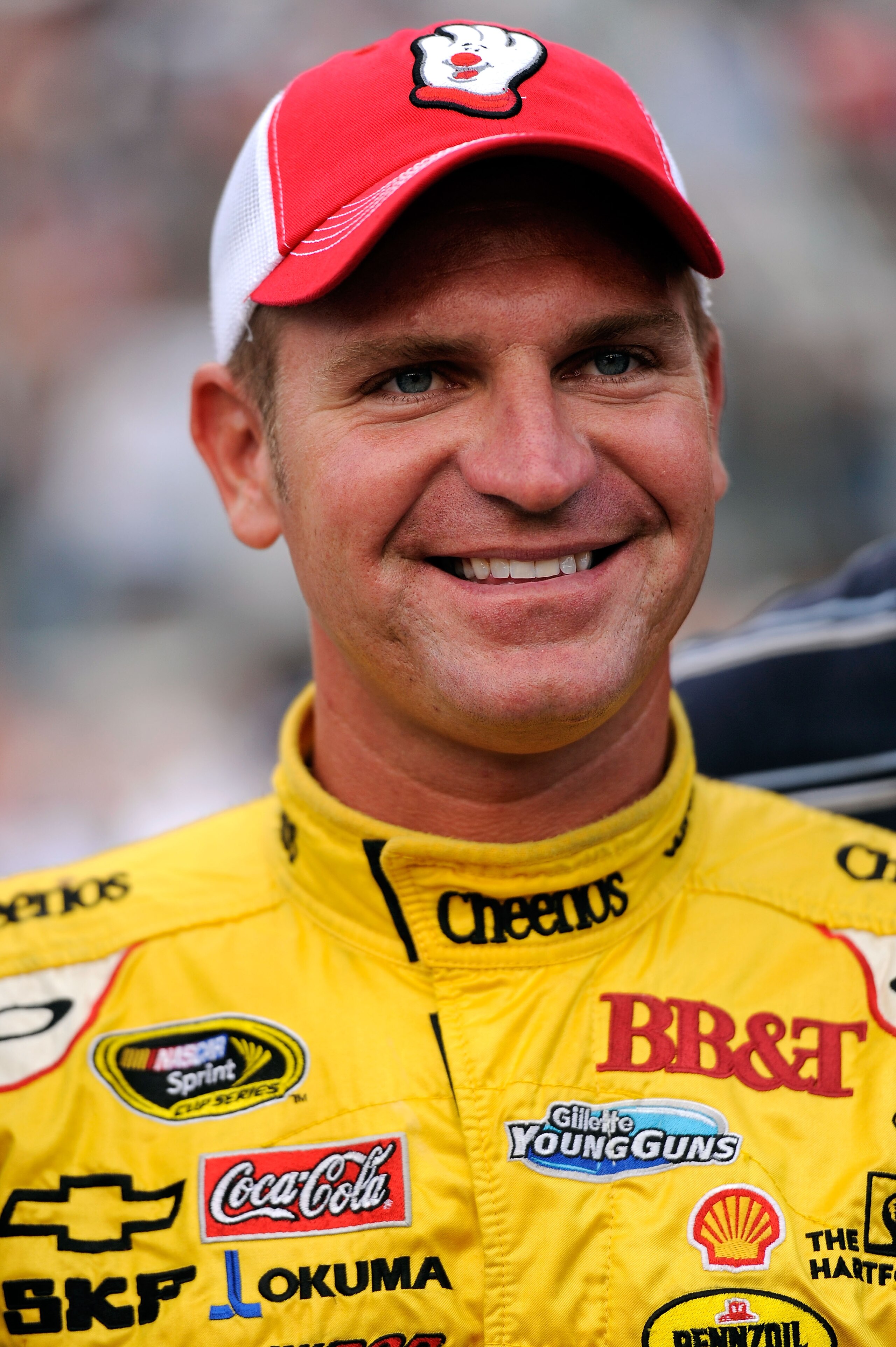 BRISTOL, TN - AUGUST 21:  Clint Bowyer, driver of the #33 Hamburger Helper Chevrolet, stands on the grid prior to the start of the NASCAR Sprint Cup Series IRWIN Tools Night Race at Bristol Motor Speedway on August 21, 2010 in Bristol, Tennessee.  (Photo