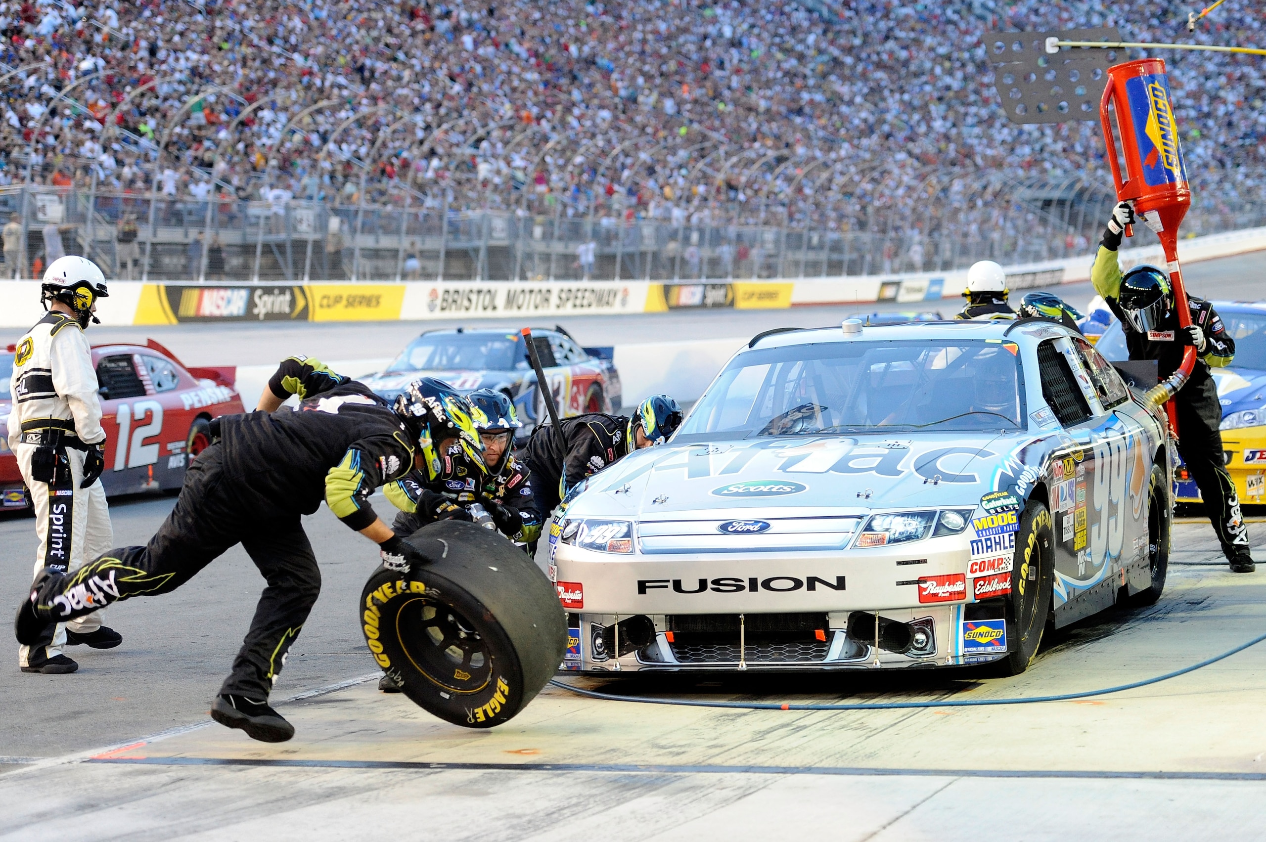 BRISTOL, TN - AUGUST 21:  Carl Edwards, driver of the #99 Aflac Ford, pits during the NASCAR Sprint Cup Series IRWIN Tools Night Race at Bristol Motor Speedway on August 21, 2010 in Bristol, Tennessee.  (Photo by John Harrelson/Getty Images for NASCAR)