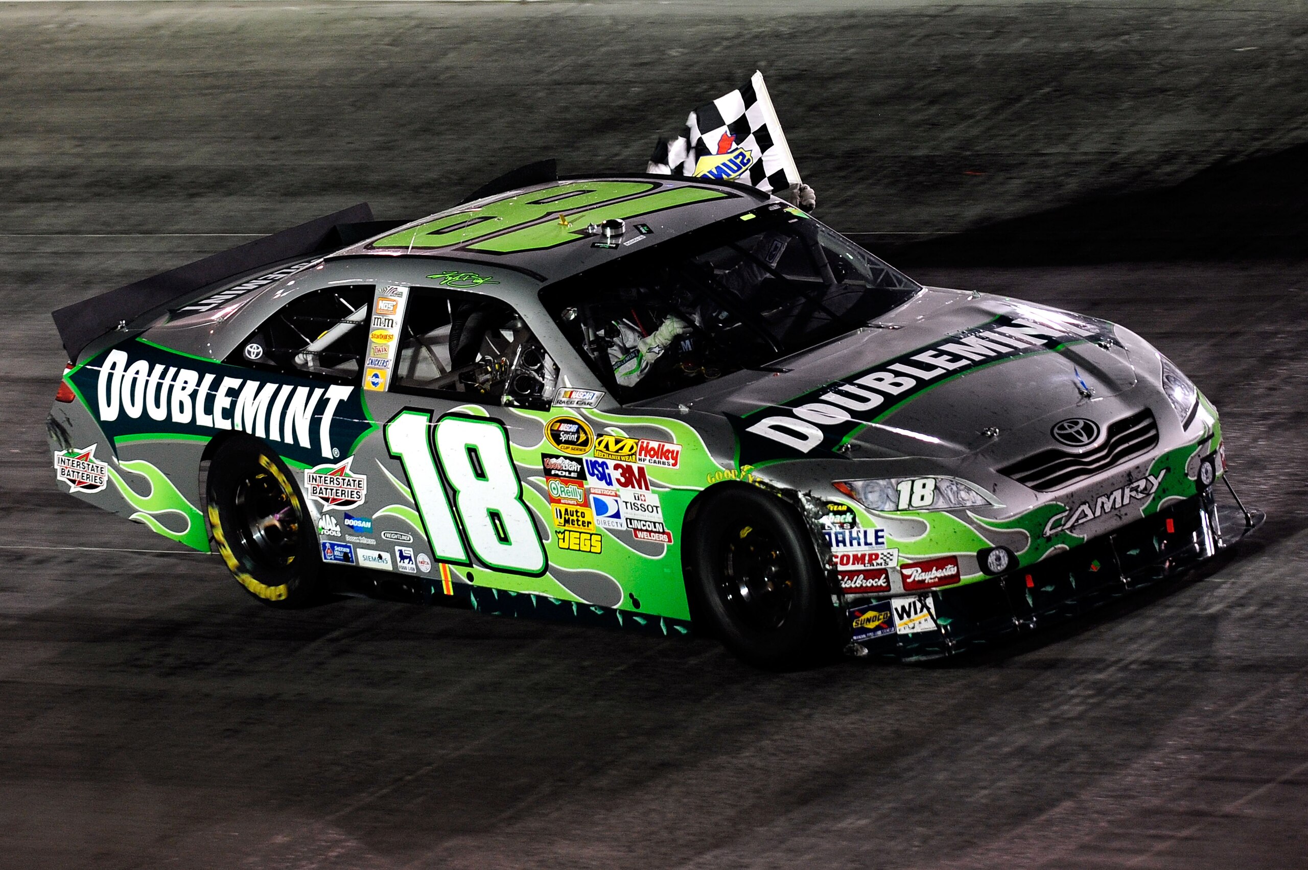 BRISTOL, TN - AUGUST 21:  Kyle Busch, driver of the #18 Doublemint Toyota, celebrates on track after winning the NASCAR Sprint Cup Series IRWIN Tools Night Race at Bristol Motor Speedway on August 21, 2010 in Bristol, Tennessee.  (Photo by Getty Images/Ge