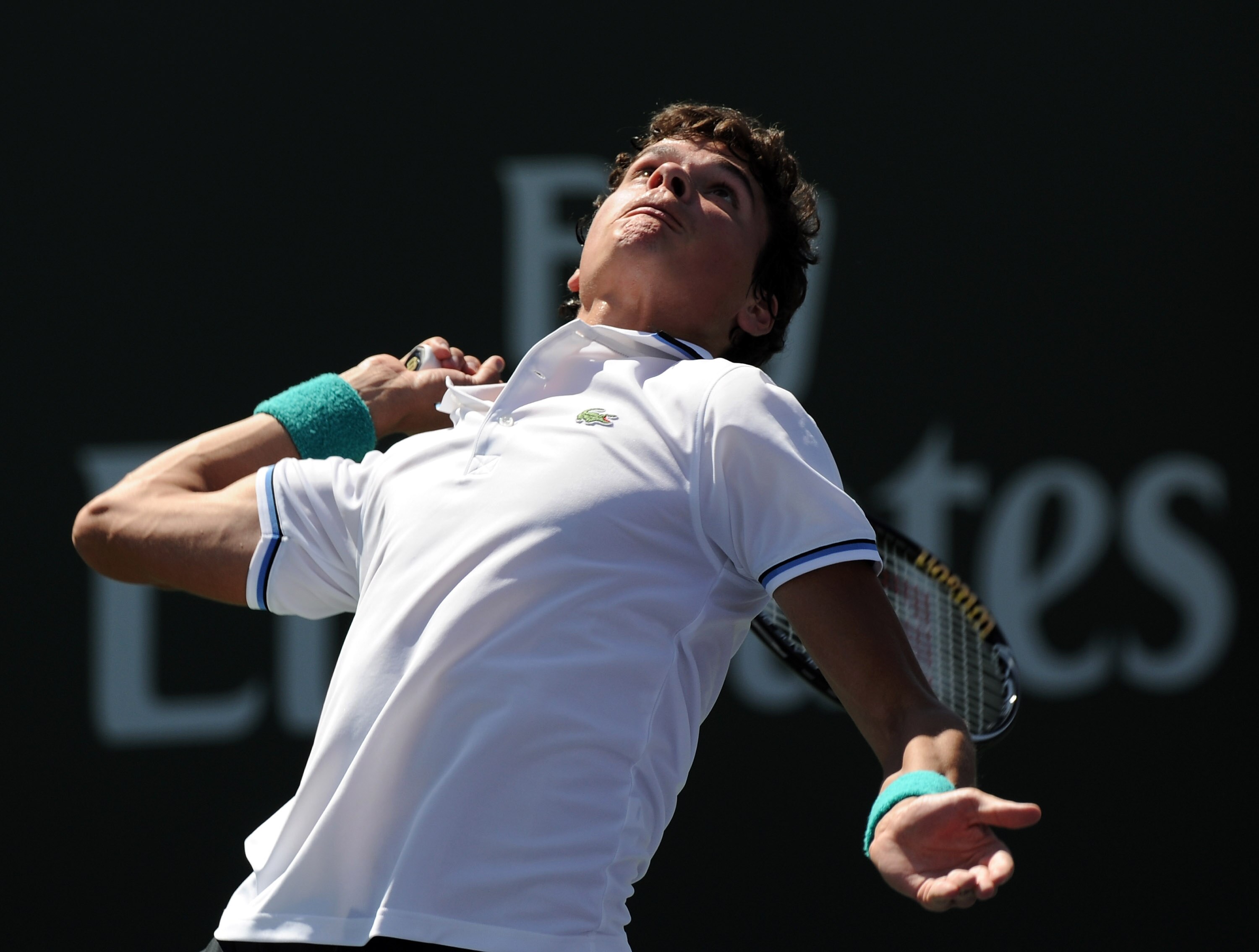 INDIAN WELLS, CA - MARCH 11:  Milos Raonic of Canada serves in his match against Marsel Ilhan of Turkey during the BNP Paribas Open at the Indian Wells Tennis Garden on March 11, 2011 in Indian Wells, California.  (Photo by Harry How/Getty Images)
