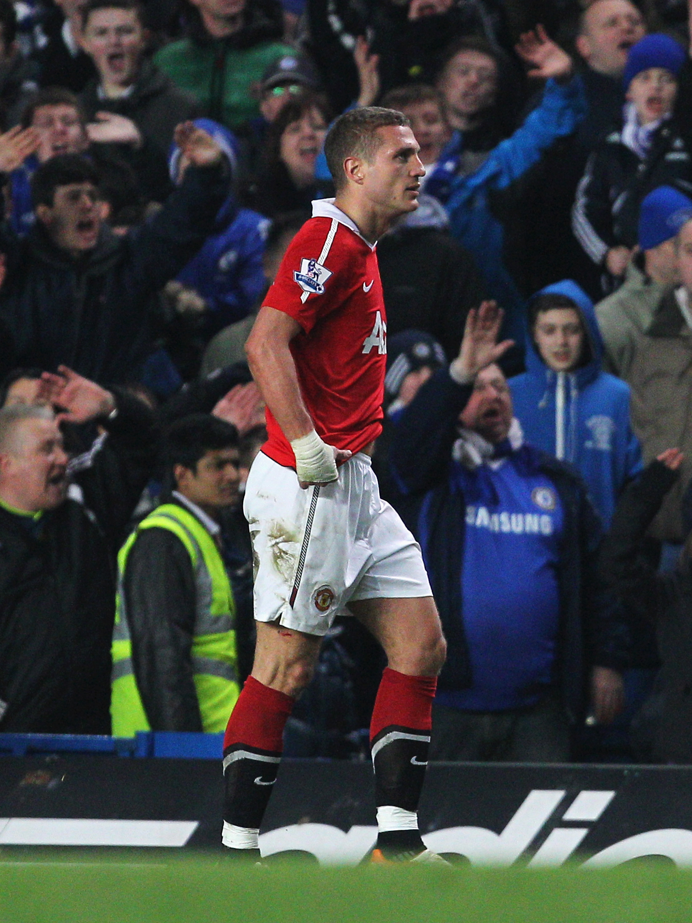 LONDON, ENGLAND - MARCH 01:  Nemanja Vidic of Manchester United walks off after being shown the red card by referee Martin Atkinson during the Barclays Premier League match between Chelsea and Manchester United at Stamford Bridge on March 1, 2011 in Londo