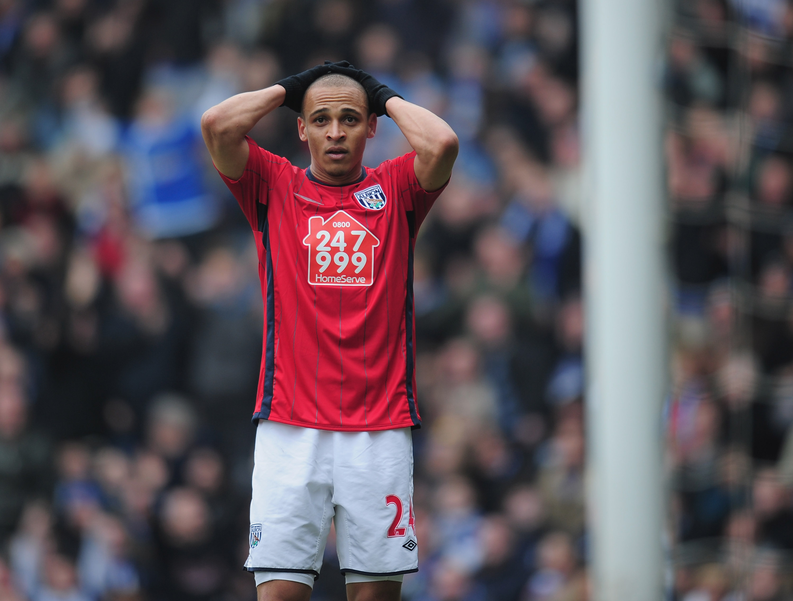 BIRMINGHAM, ENGLAND - MARCH 05:  Peter Odemwingie of West Bromich Albion holds his head in his hands after missing an easy chance during the Barclays Premier League match between Birmingham City and West Bromwich Albion  on March 5, 2011 in Birmingham, En