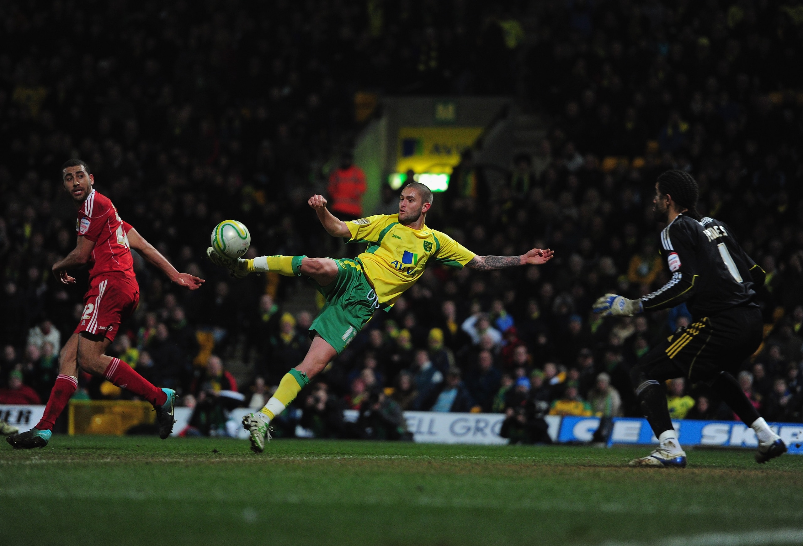 NORWICH, ENGLAND - MARCH 14:  Henri Lansbury of Norwich scores a goal during the npower Chapionship match between Norwich City and Bristol City at Carrow Road on March 14, 2011 in Norwich, England.  (Photo by Jamie McDonald/Getty Images)