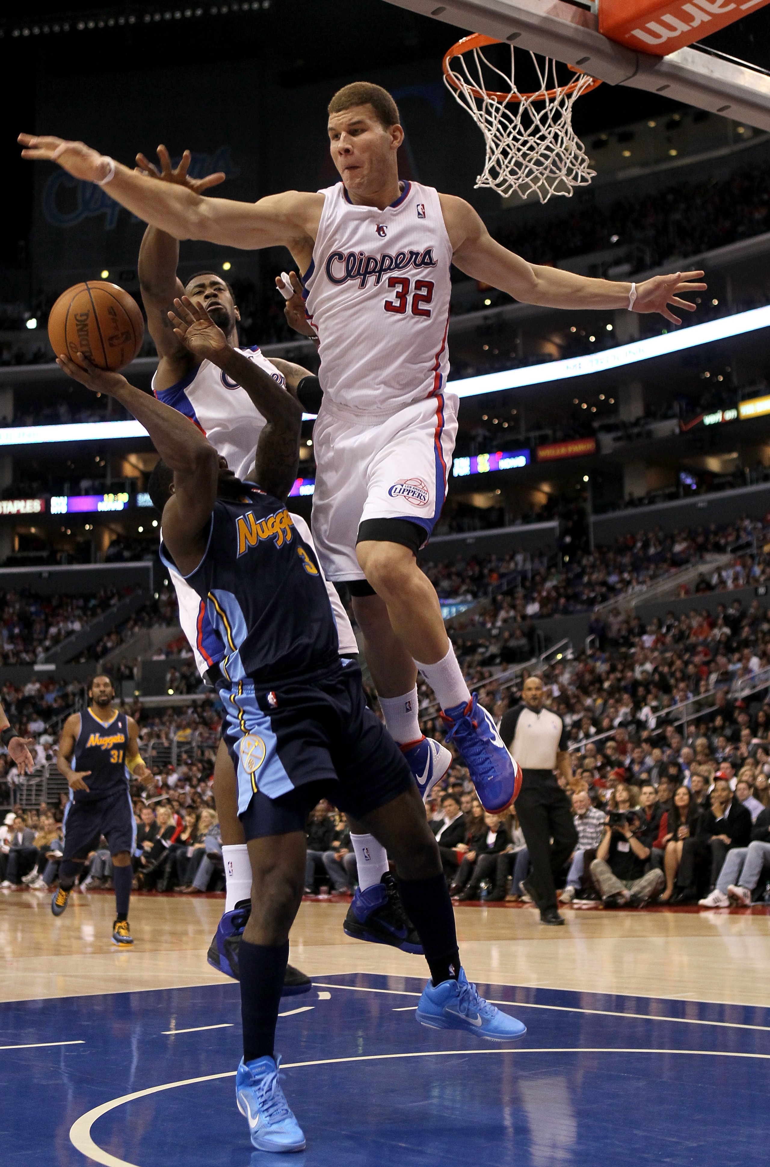 LOS ANGELES, CA - MARCH 05:  Blake Griffin #32 of the Los Angeles Clippers blocks a shot by Ty Lawson #3 of the Denver Nuggets at Staples Center on March 5, 2011 in Los Angeles, California.  The Clippers won 100-94. NOTE TO USER: User expressly acknowledg