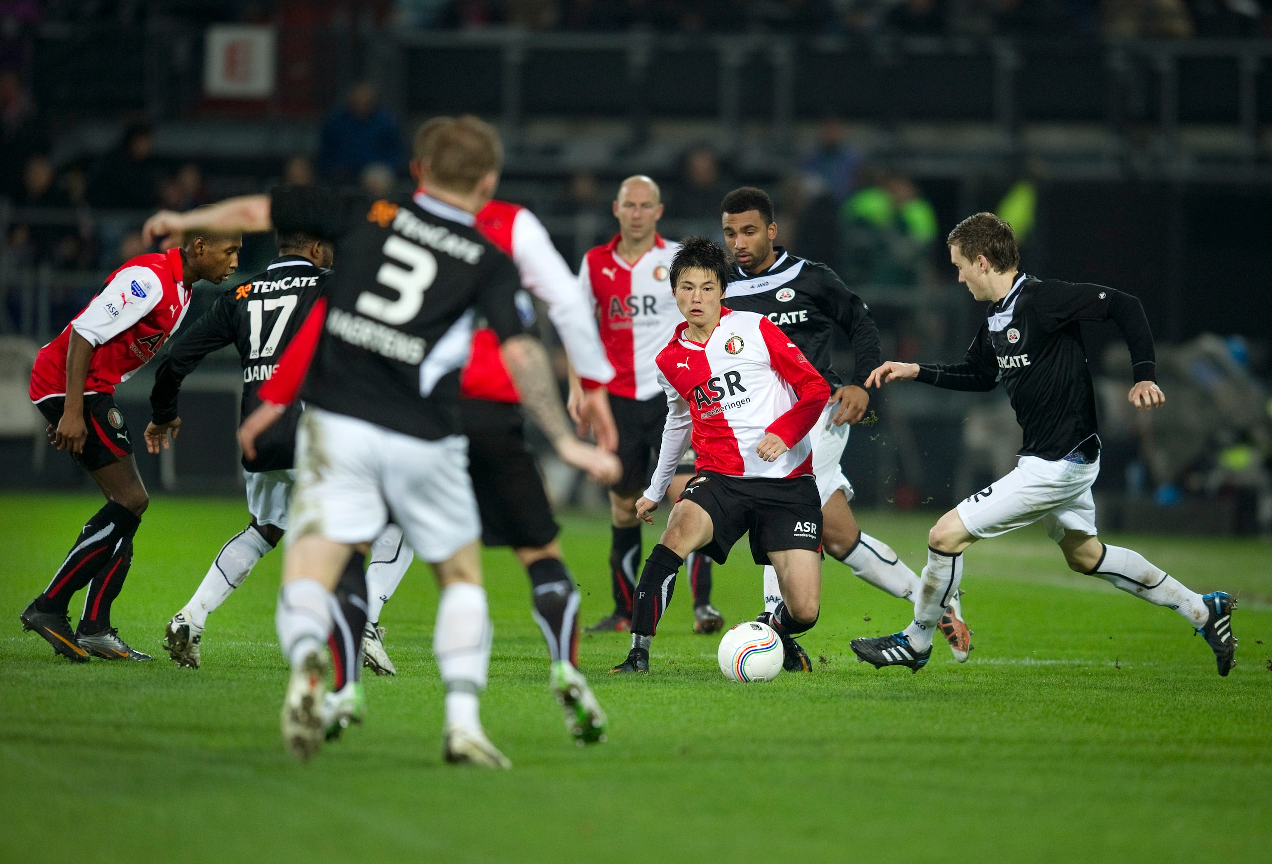 ROTTERDAM, NETHERLANDS - FEBRUARY 12:  Ryo Miyaichi (M) in action during the Eredivisie match between Feyenoord and Heracles at the Kuip on February 12, 2011 in Rotterdam, Netherlands.  (Photo by Olaf Kraak/Getty Images)