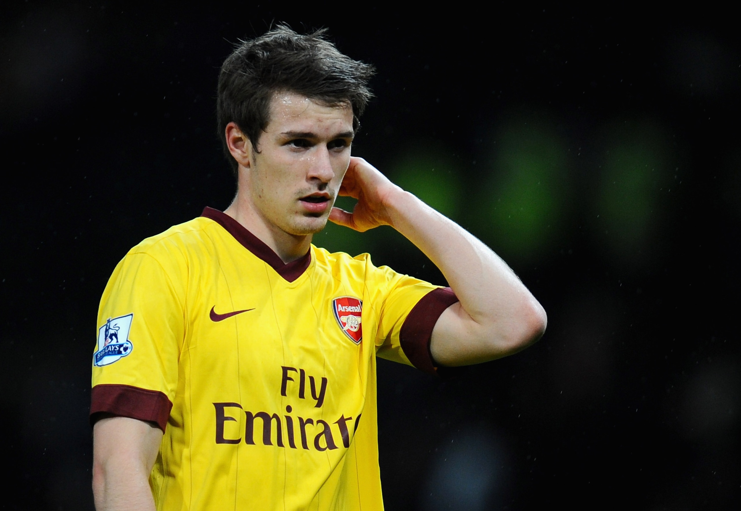 MANCHESTER, ENGLAND - MARCH 12:  Aaron Ramsey of Arsenal looks dejected after defeat in the FA Cup sponsored by E.On Sixth Round match between Manchester United and Arsenal at Old Trafford on March 12, 2011 in Manchester, England.  (Photo by Clive Mason/G