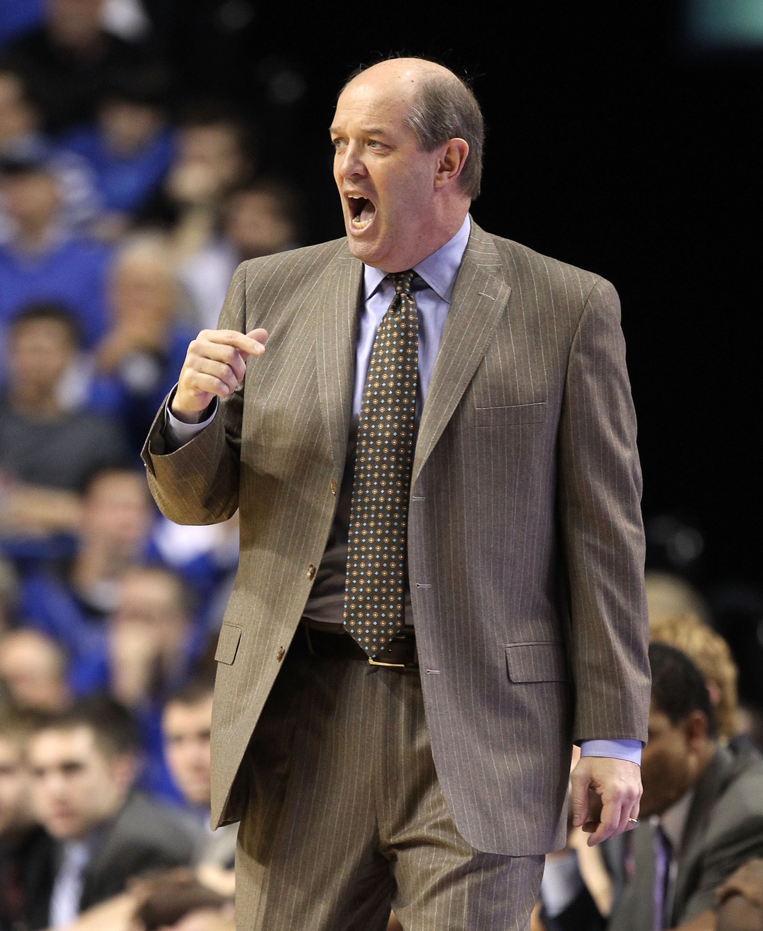LEXINGTON, KY - MARCH 01:  Kevin Stallings the Head Coach of the Vanderbilt Commodores gives instructions to his team during the SEC game against the Kentucky Wildcats  at Rupp Arena on March 1, 2011 in Lexington, Kentucky.  (Photo by Andy Lyons/Getty Ima