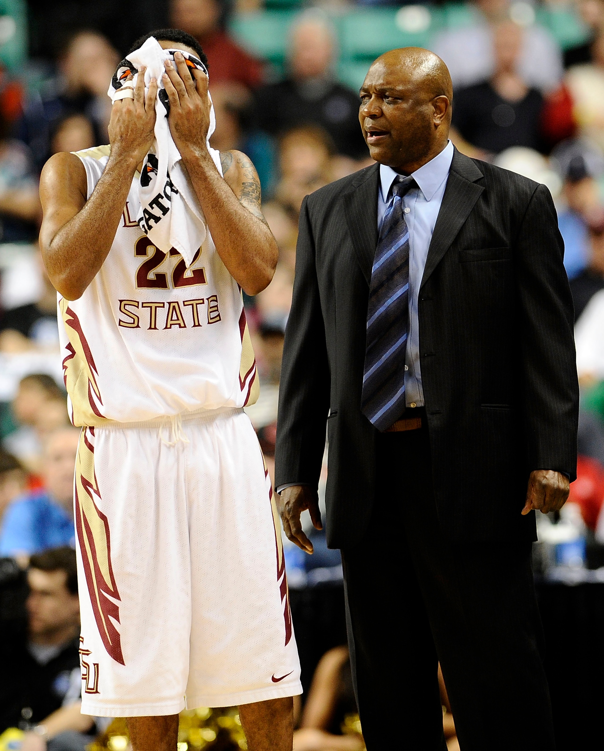 GREENSBORO, NC - MARCH 12:  Leonard Hamilton, head coach, talks to Derwin Kitchen #22 of the Florida State Seminoles against the North Carolina State Wolfpack in their quarterfinal game in the 2010 ACC Men's Basketball Tournament at the Greensboro Coliseu
